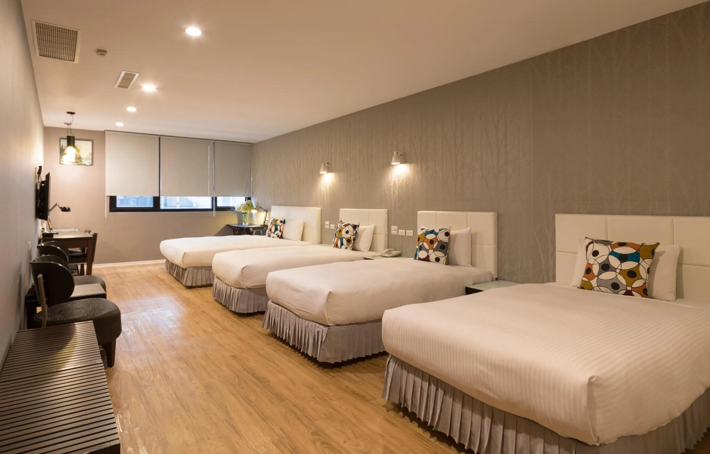 Bed in Just Enjoy Business Hotel