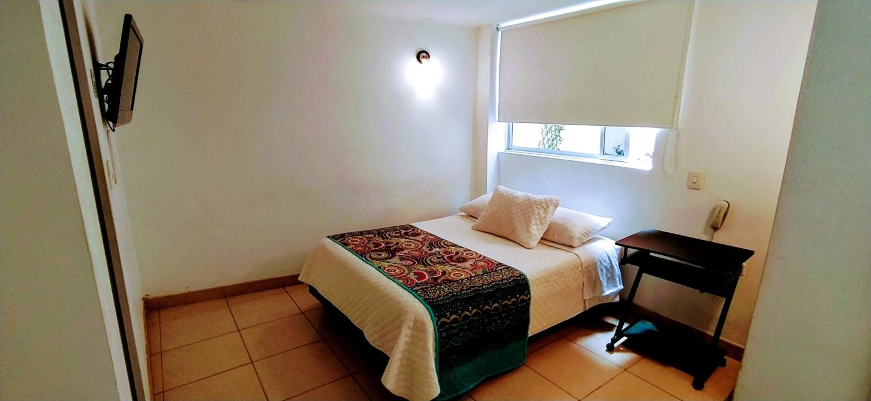 Bed in Hotel Villa Karina