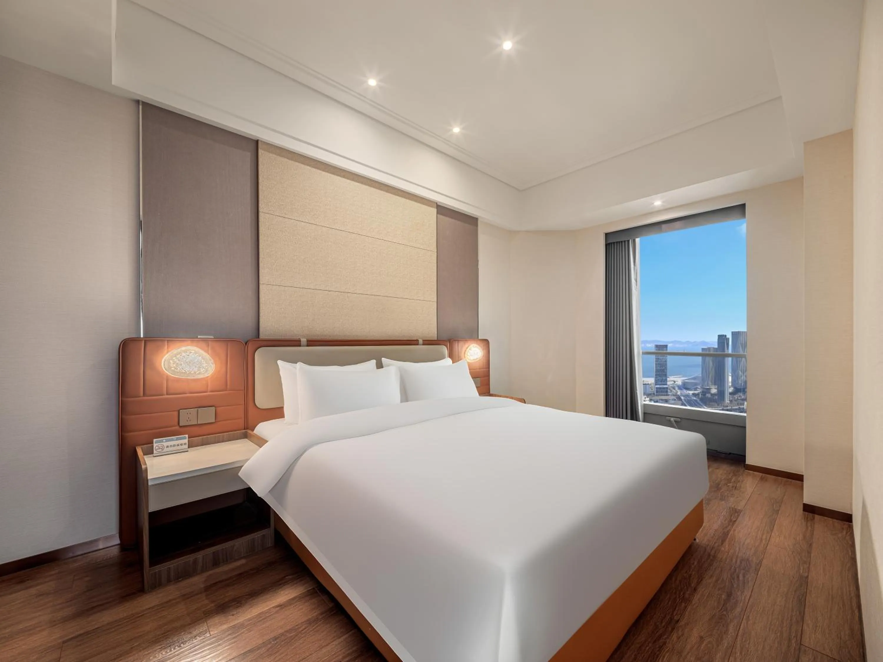 Bed in Dalian Zhongshan Square Seaview Meilun Hotel