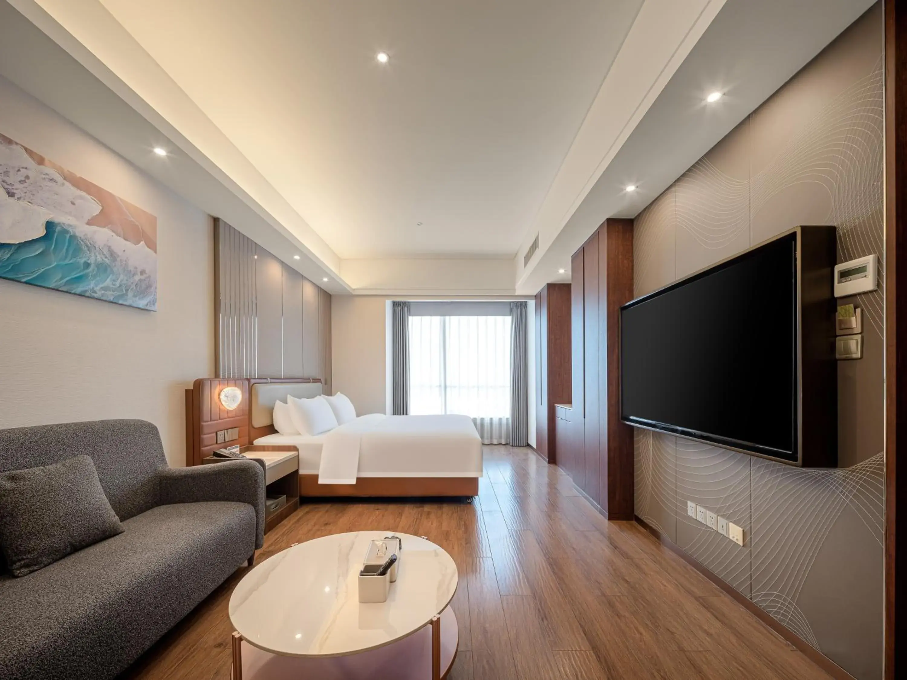 Living room, Bed in Dalian Zhongshan Square Seaview Meilun Hotel Living room, Bed in Dalian Zhongshan Square Seaview Meilun Hotel