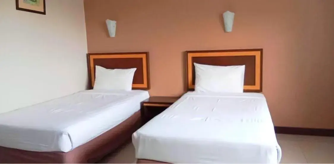 Bed in KP Hotel Udonthani Bed in KP Hotel Udonthani
