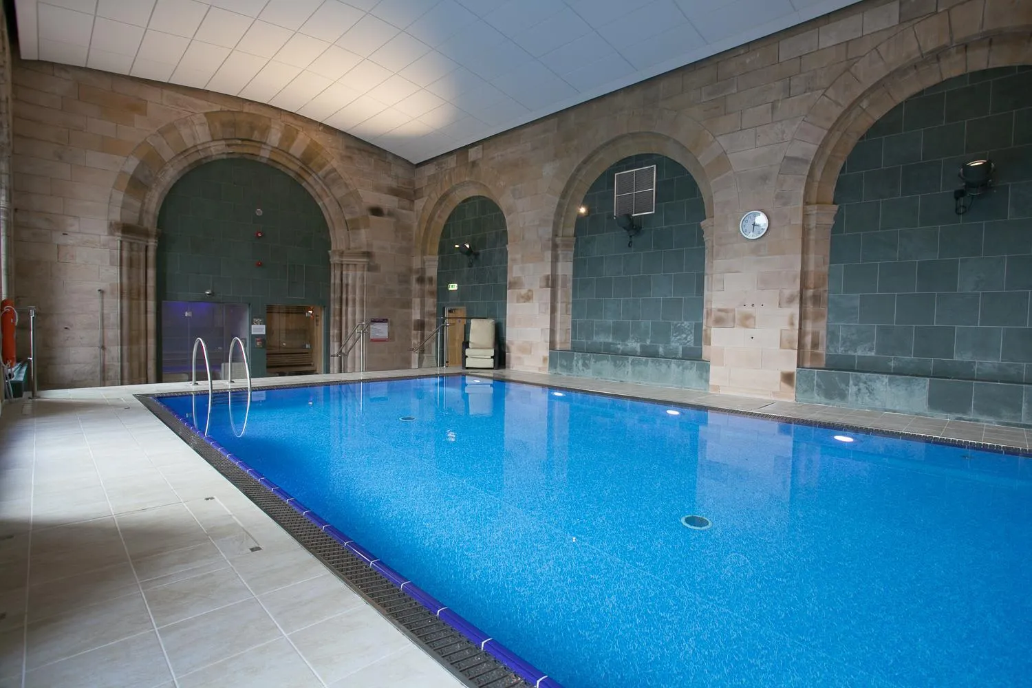 Swimming pool in Old School Apartments Highland Club