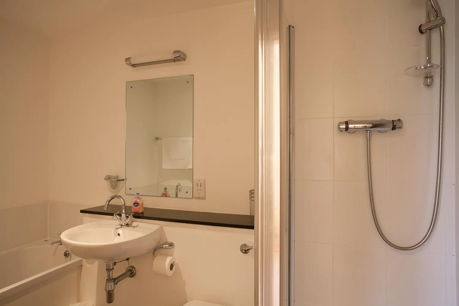 Shower in Old School Apartments Highland Club
