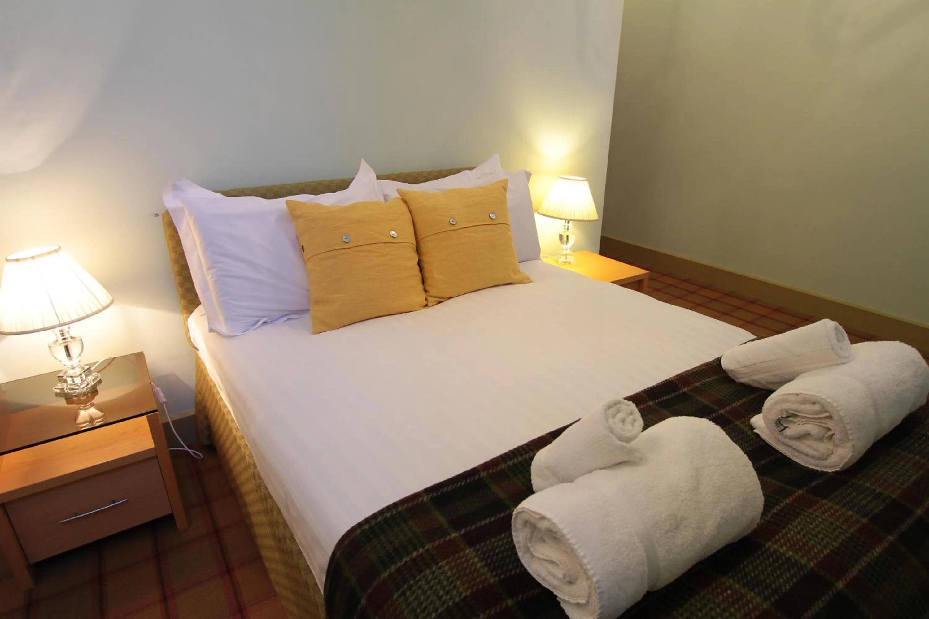 Bedroom, Bed in Old School Apartments Highland Club