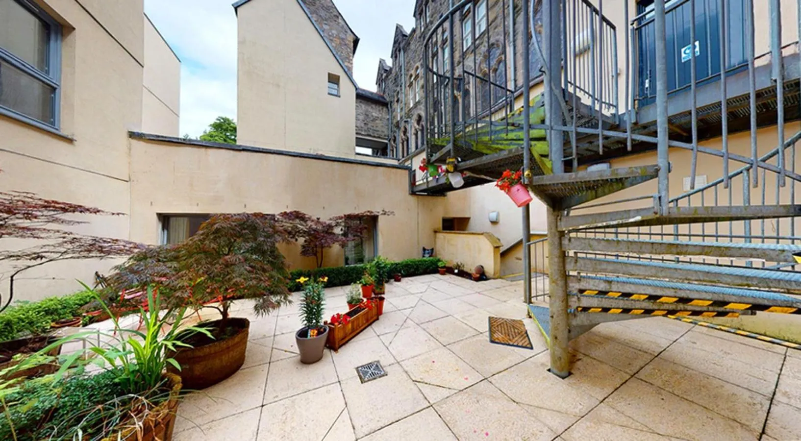 Property building in Old School Apartments Highland Club