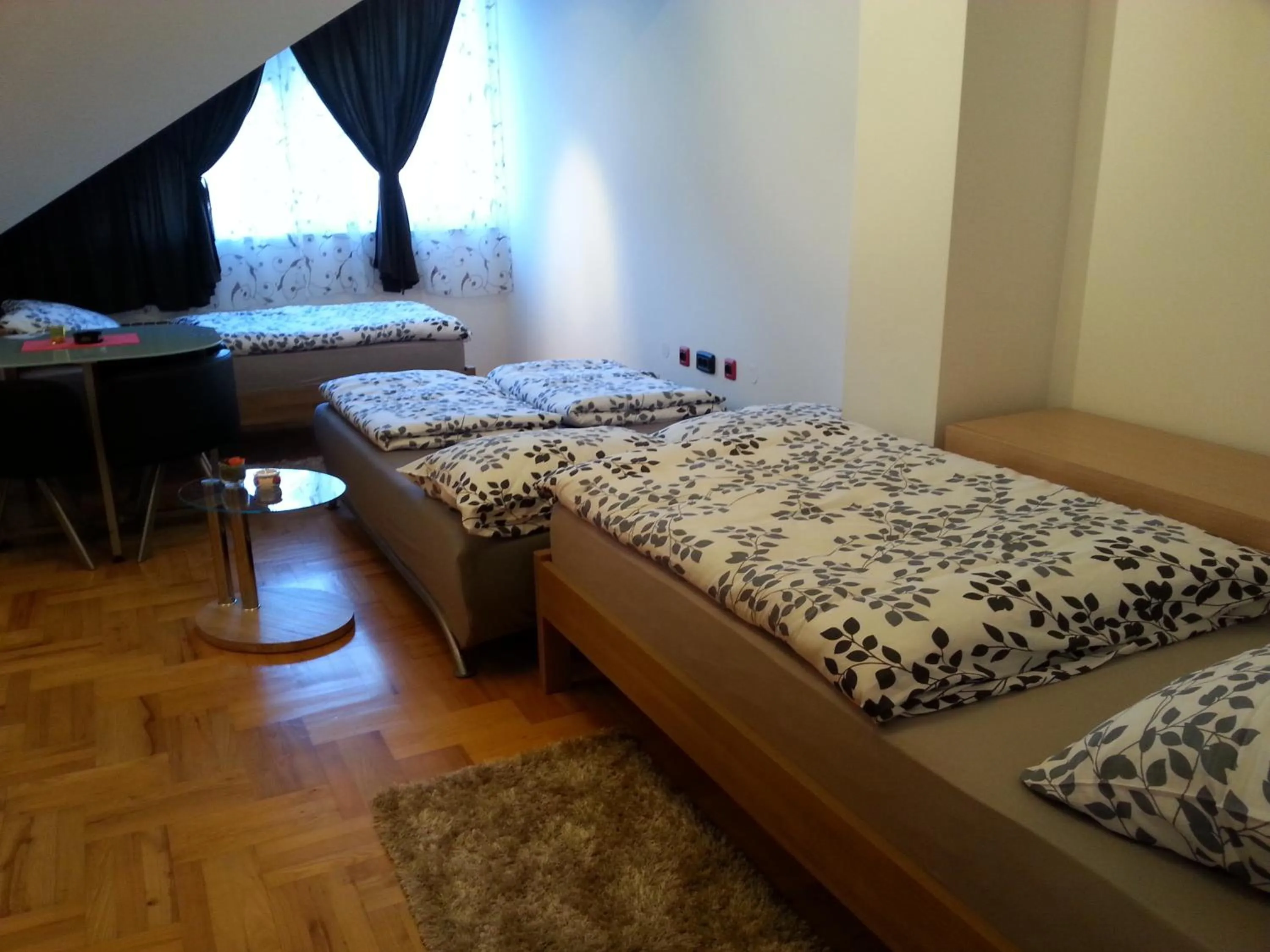 Bed in Studio Apartments Korosteljev