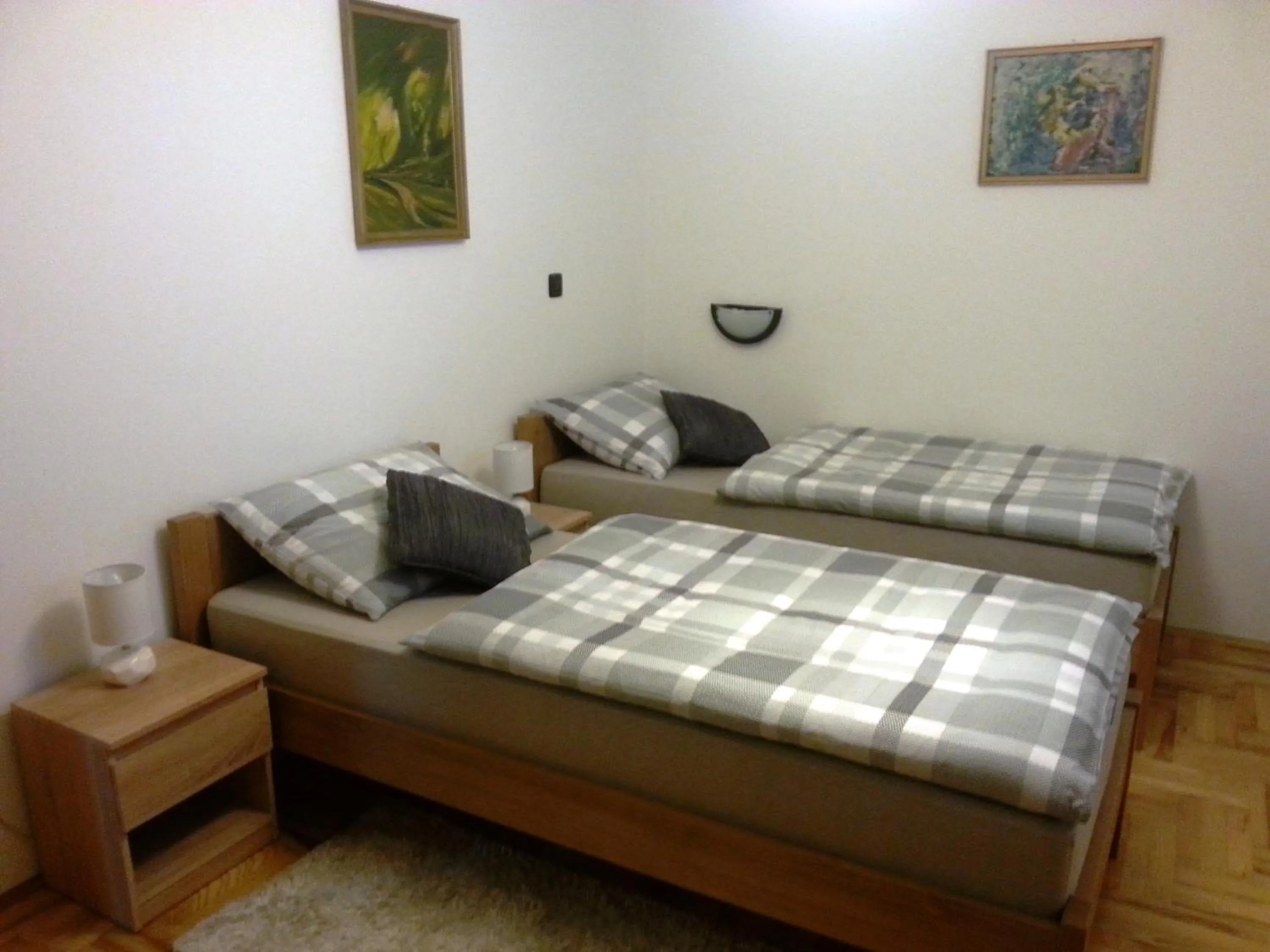 Bed in Studio Apartments Korosteljev