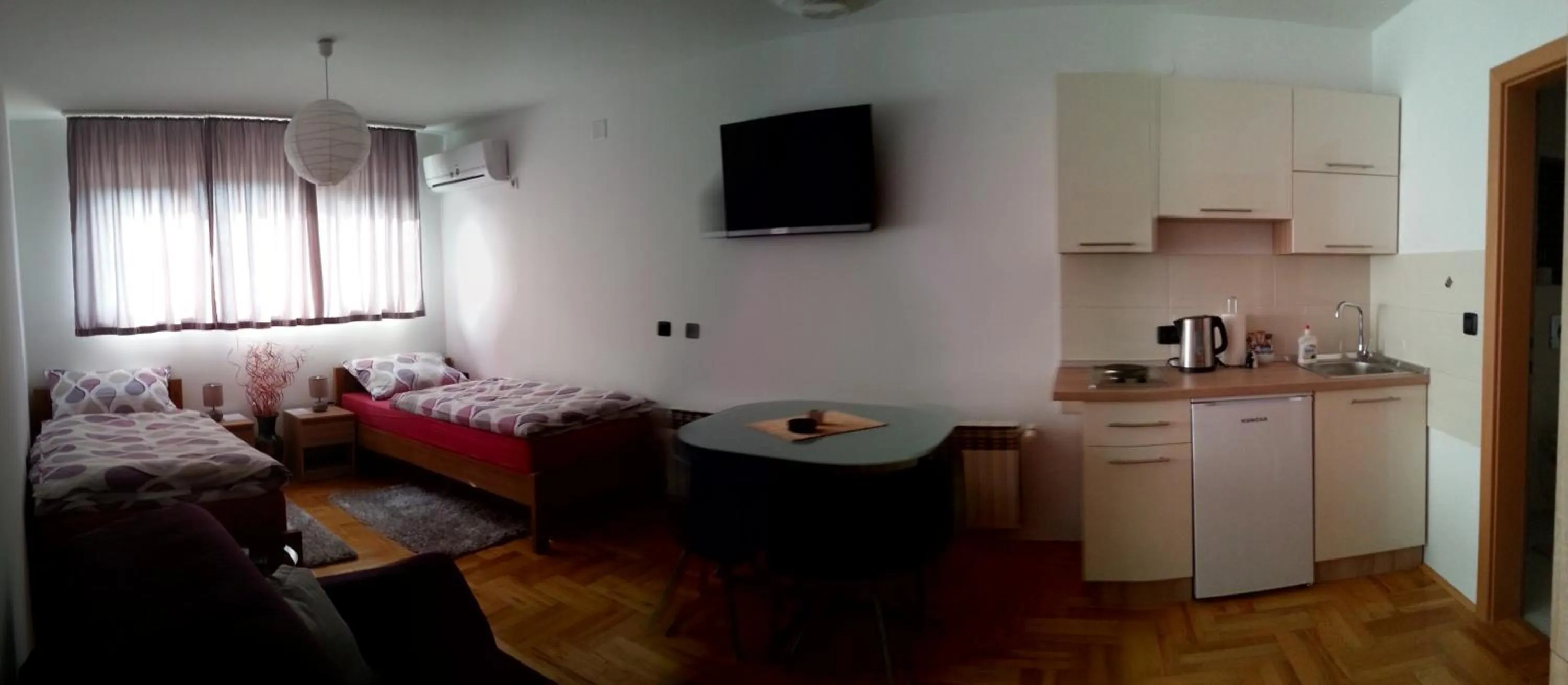 Bed in Studio Apartments Korosteljev