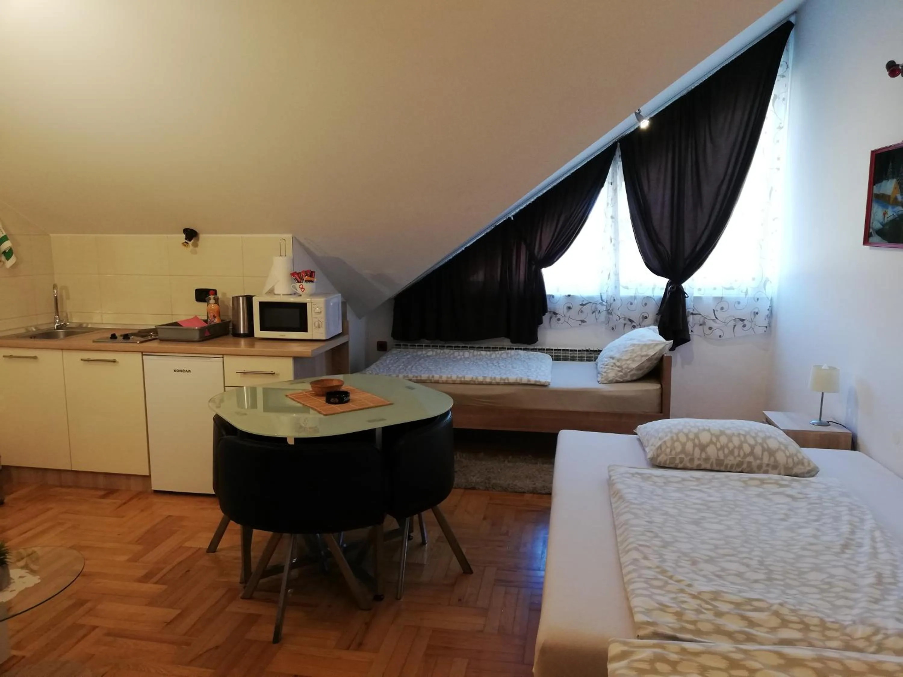 Bed in Studio Apartments Korosteljev