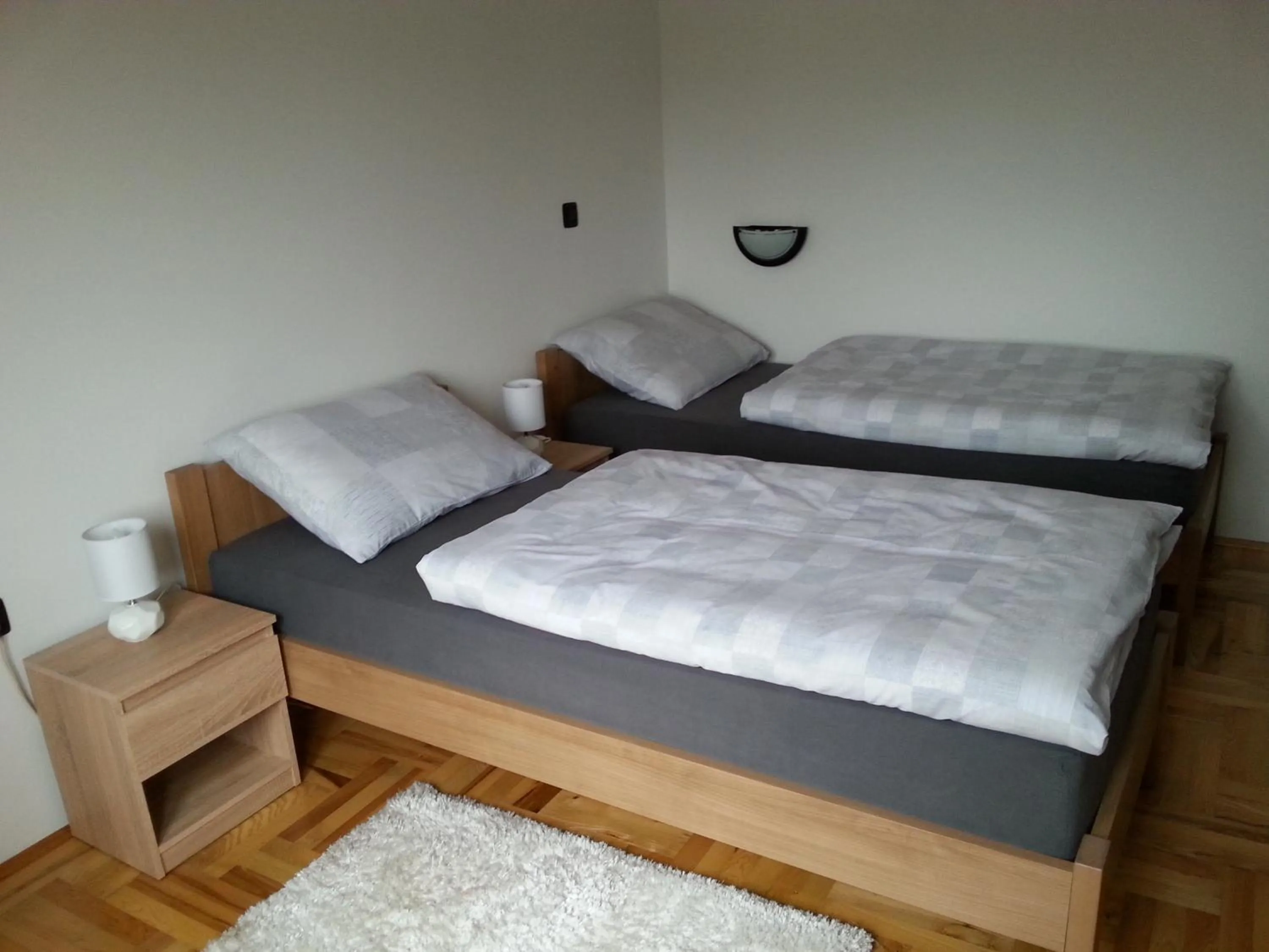 Bed in Studio Apartments Korosteljev