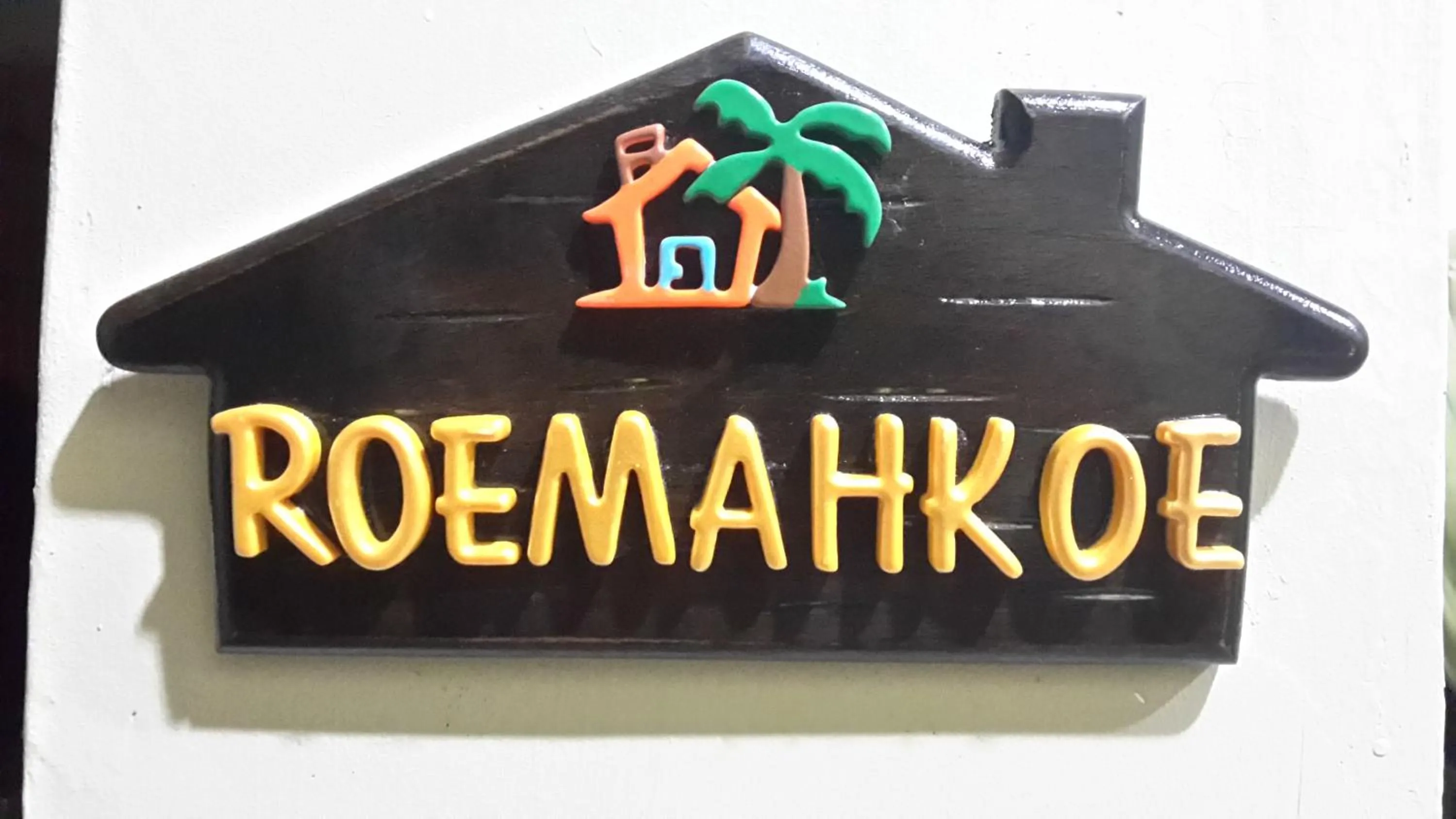 Property logo or sign in Roemahkoe Holidayhome