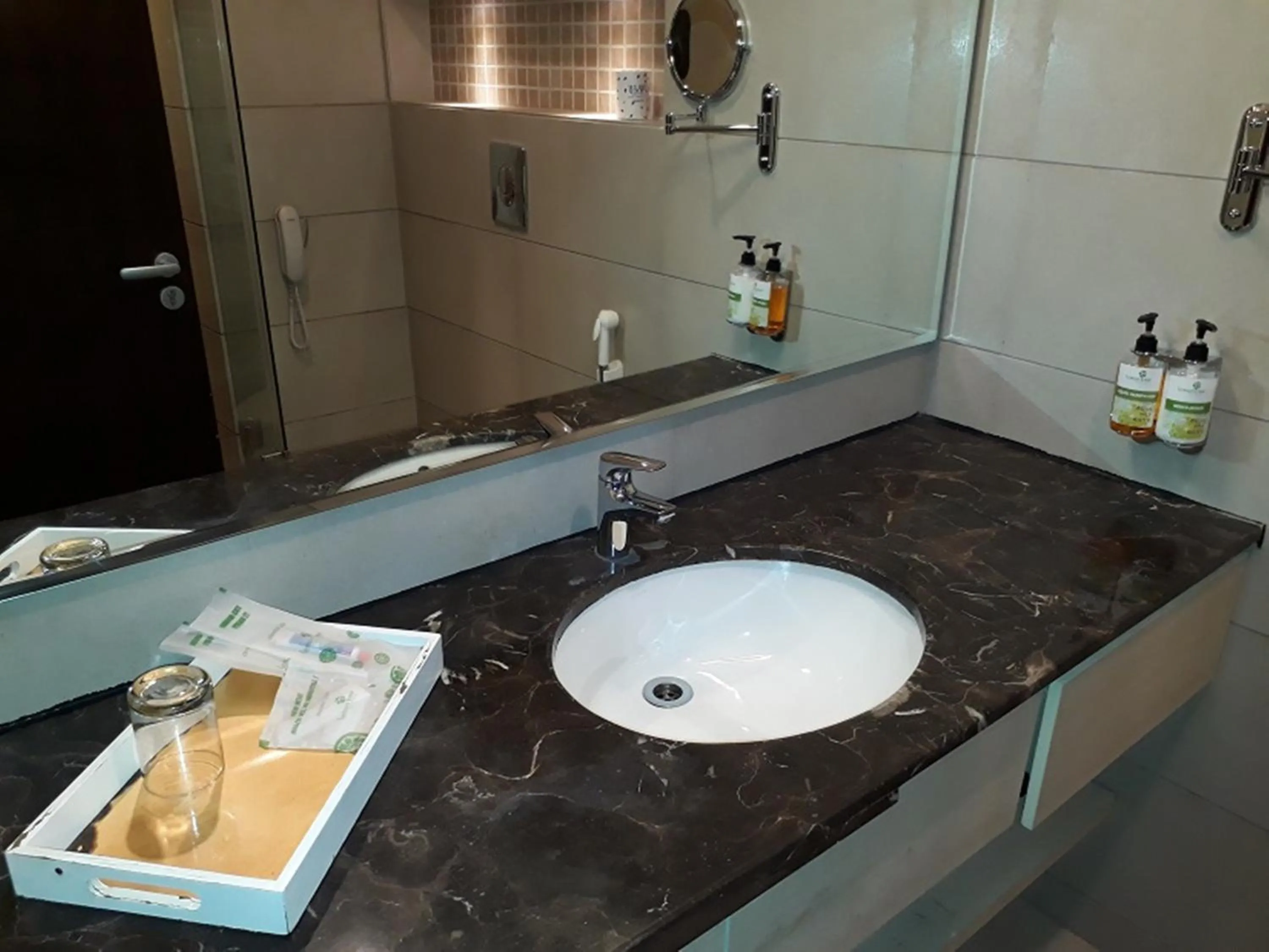 Bathroom in Lemon Tree Hotel Candolim