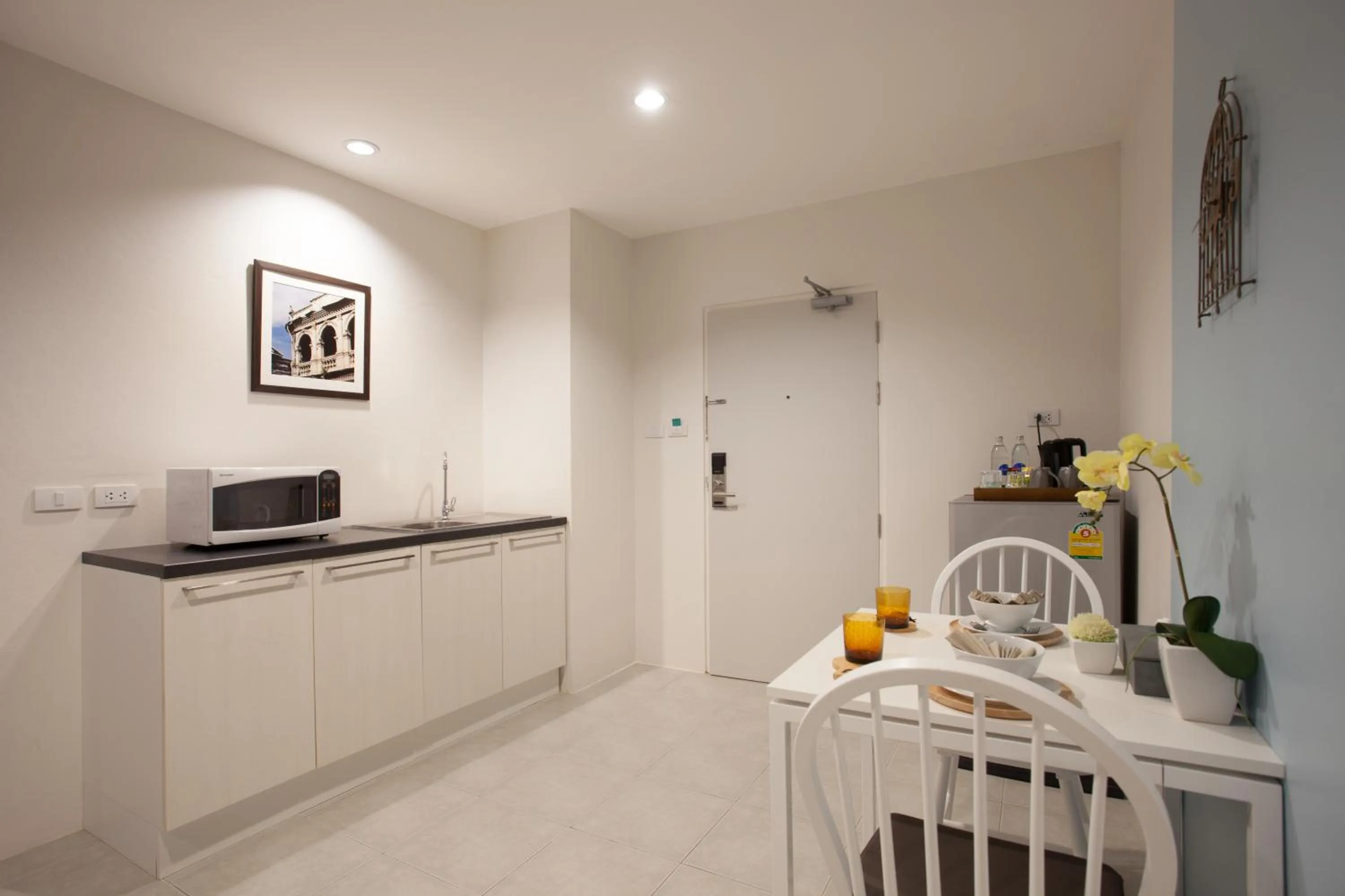 Dining area in Recenta Suite Phuket Suanluang