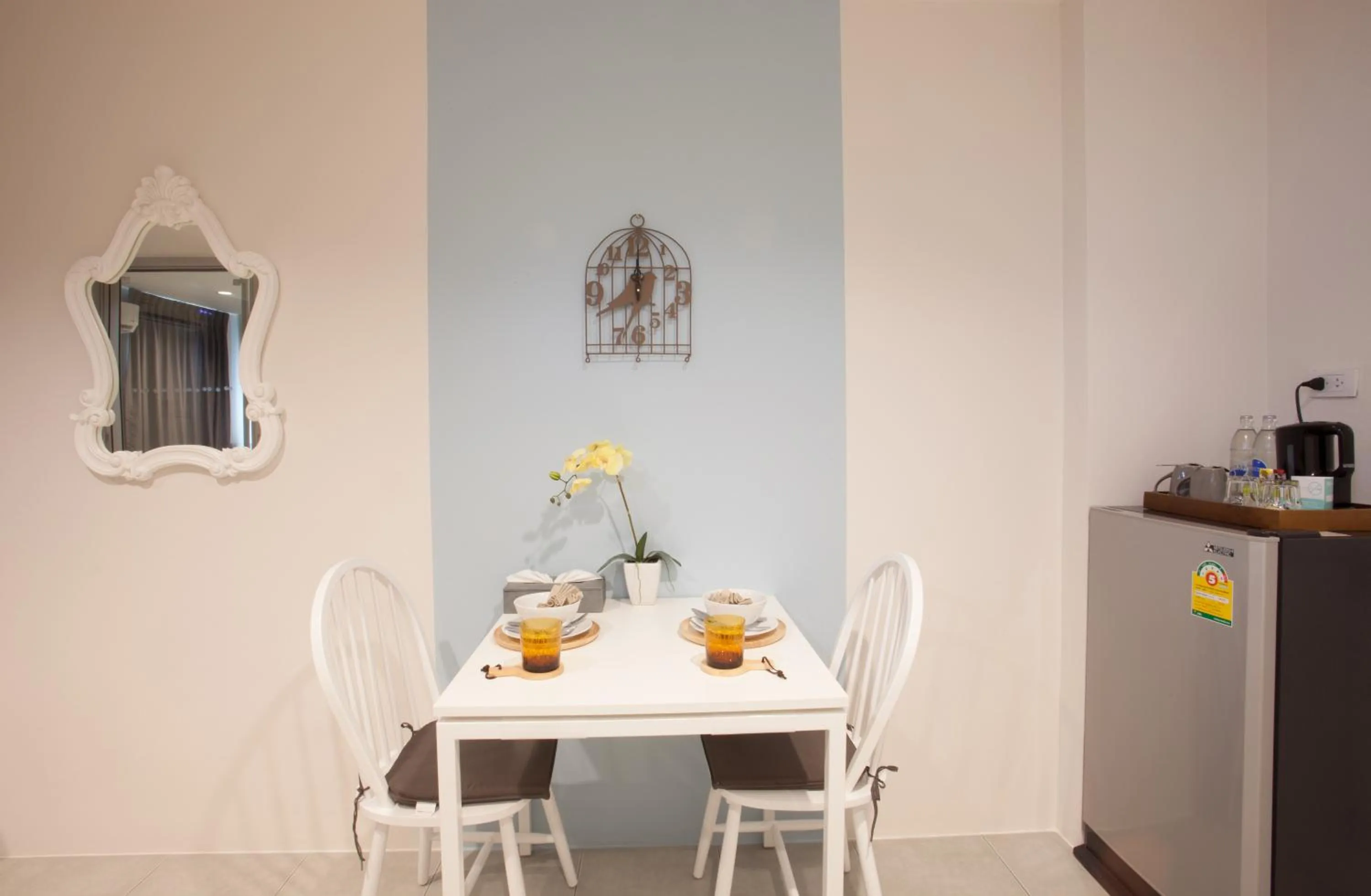 Dining area in Recenta Suite Phuket Suanluang