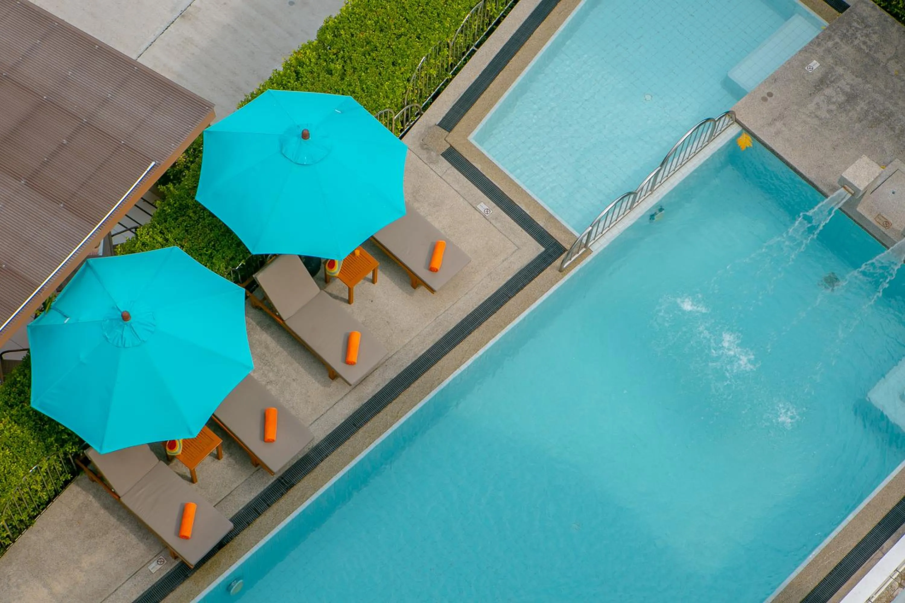 Swimming pool in Recenta Suite Phuket Suanluang