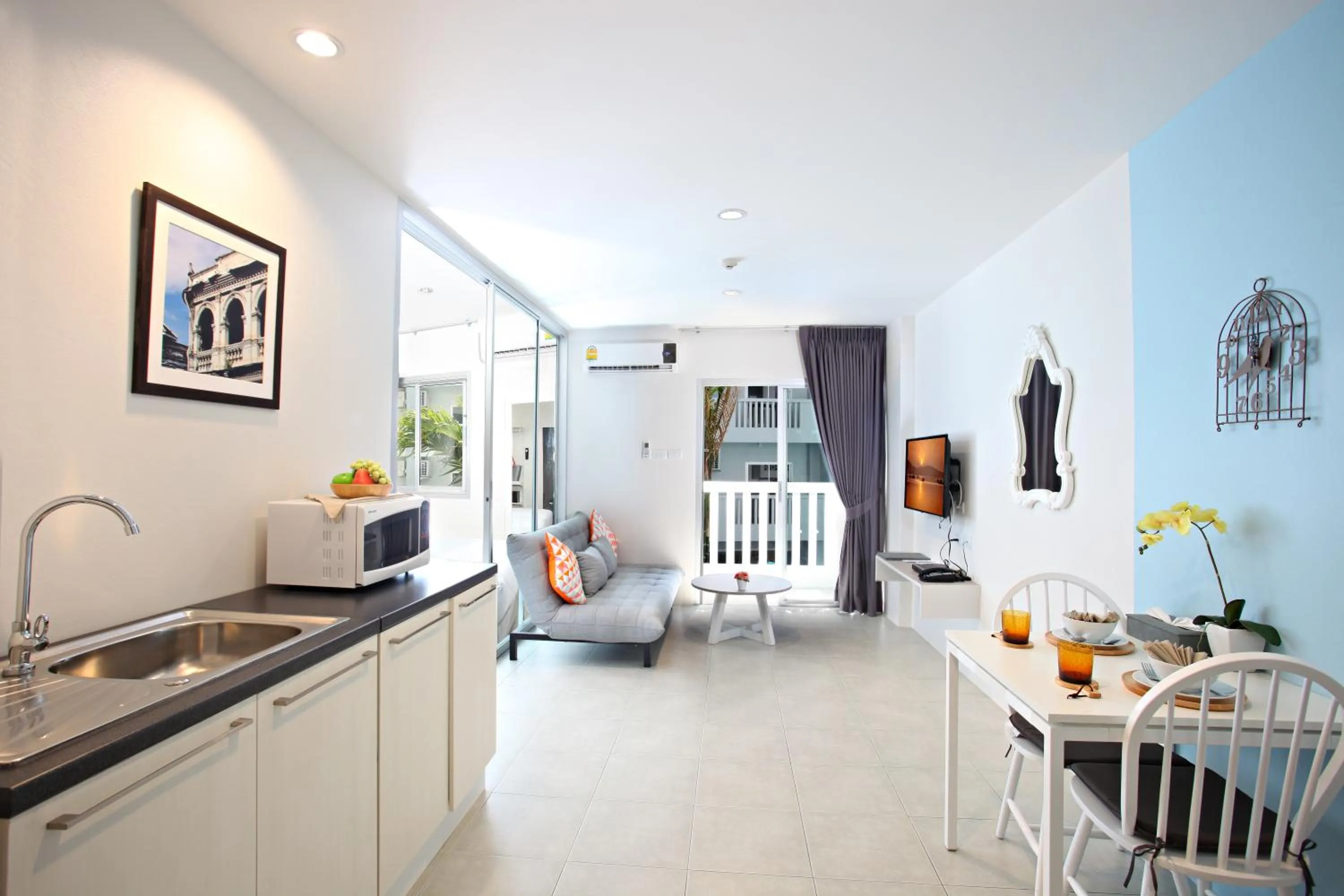 Dining area in Recenta Suite Phuket Suanluang