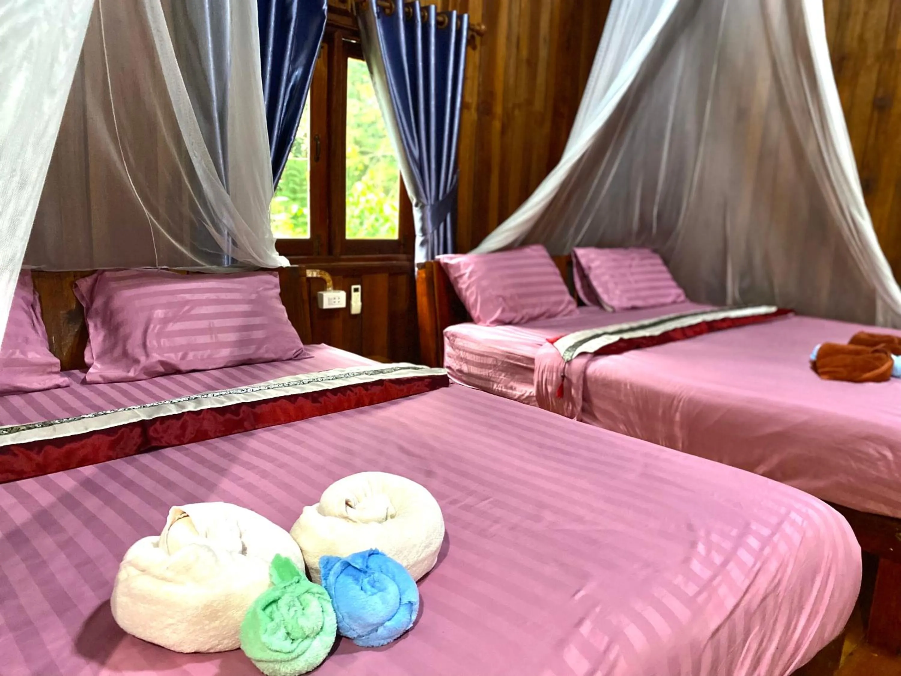 Bed in Nadia Resort Kohjum