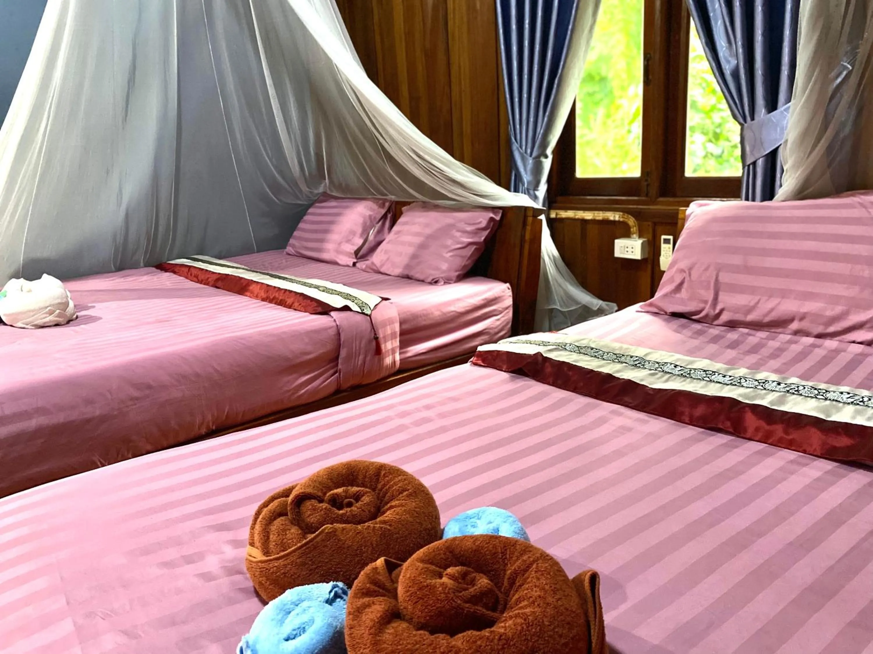 Bed in Nadia Resort Kohjum