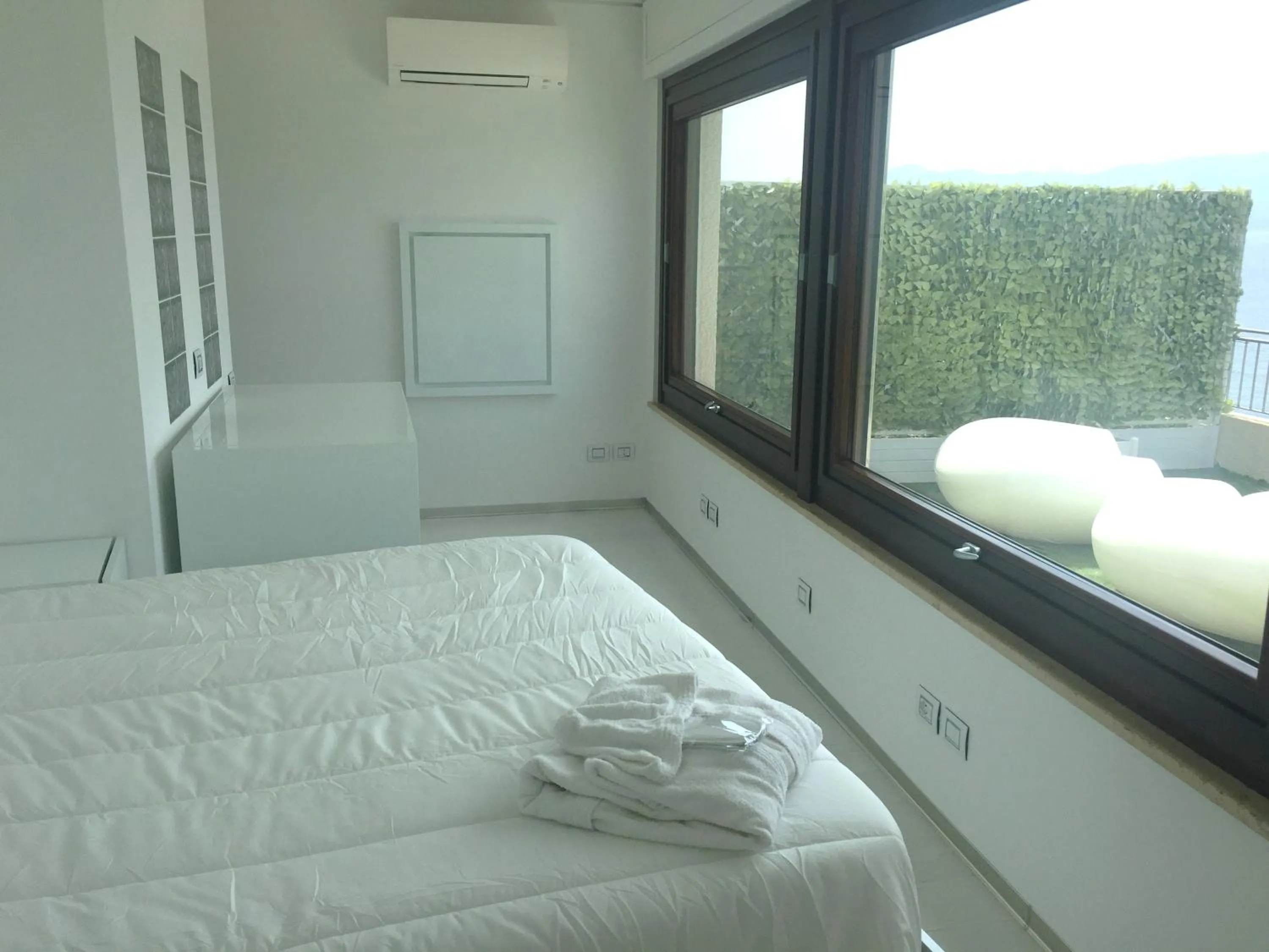Bedroom, Bed in Reggio Suite Luxury