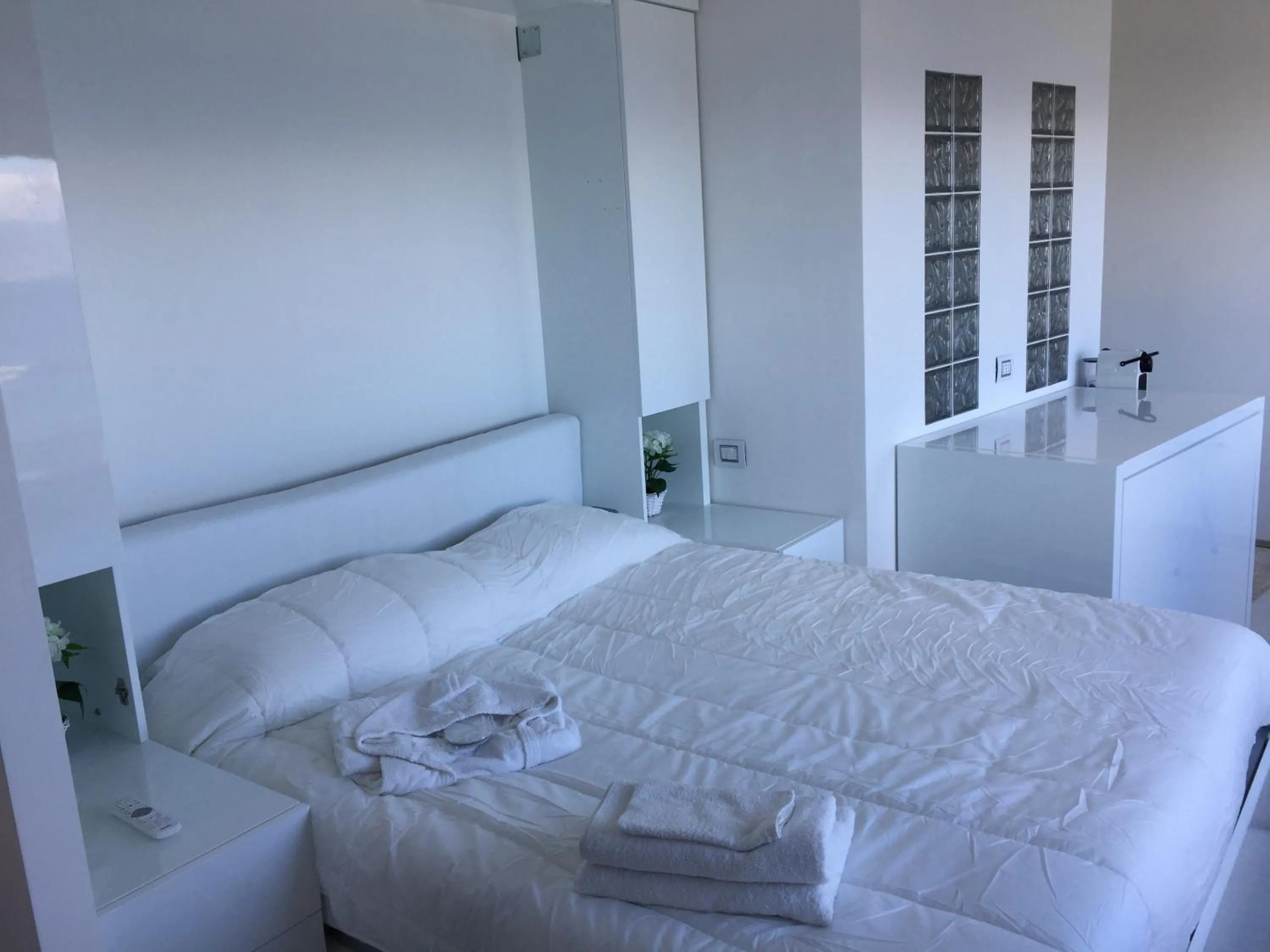 Bedroom, Bed in Reggio Suite Luxury