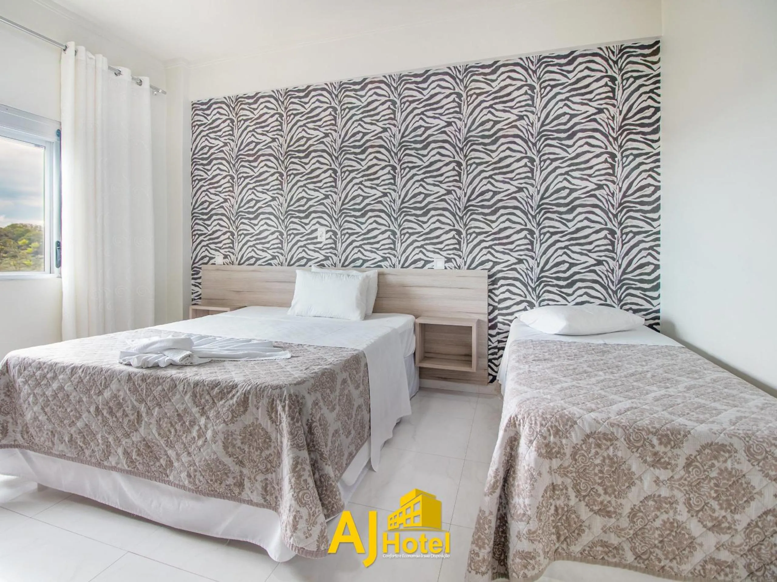 Bed in AJ Hotel Chapecó - Fácil Acesso Pátio Shopping e Rótula da Bandeira