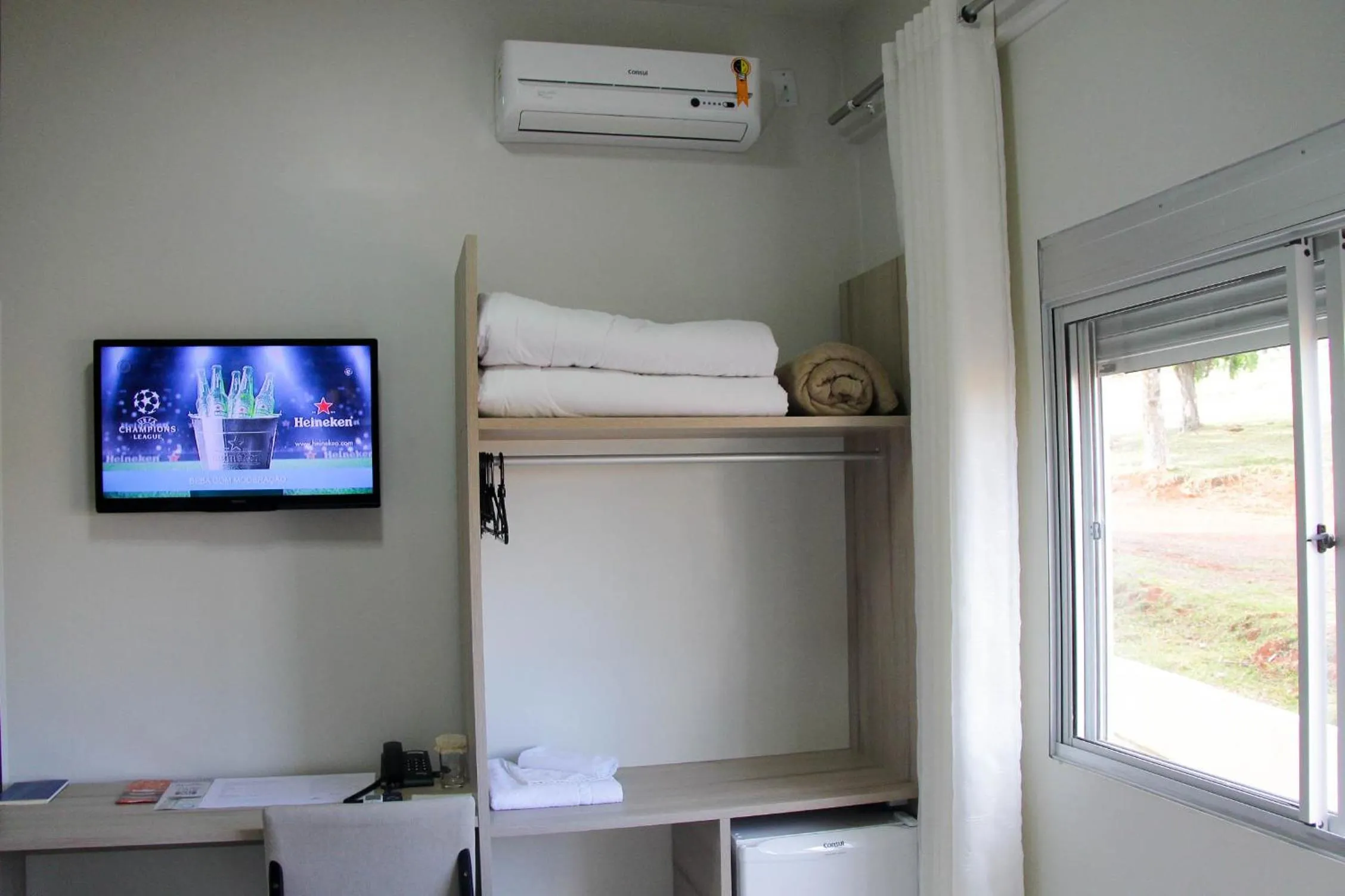 TV and multimedia, Bed in AJ Hotel Chapecó - Fácil Acesso Pátio Shopping e Rótula da Bandeira