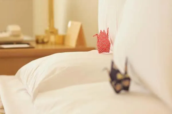 Bed in Okura Akademia Park Hotel