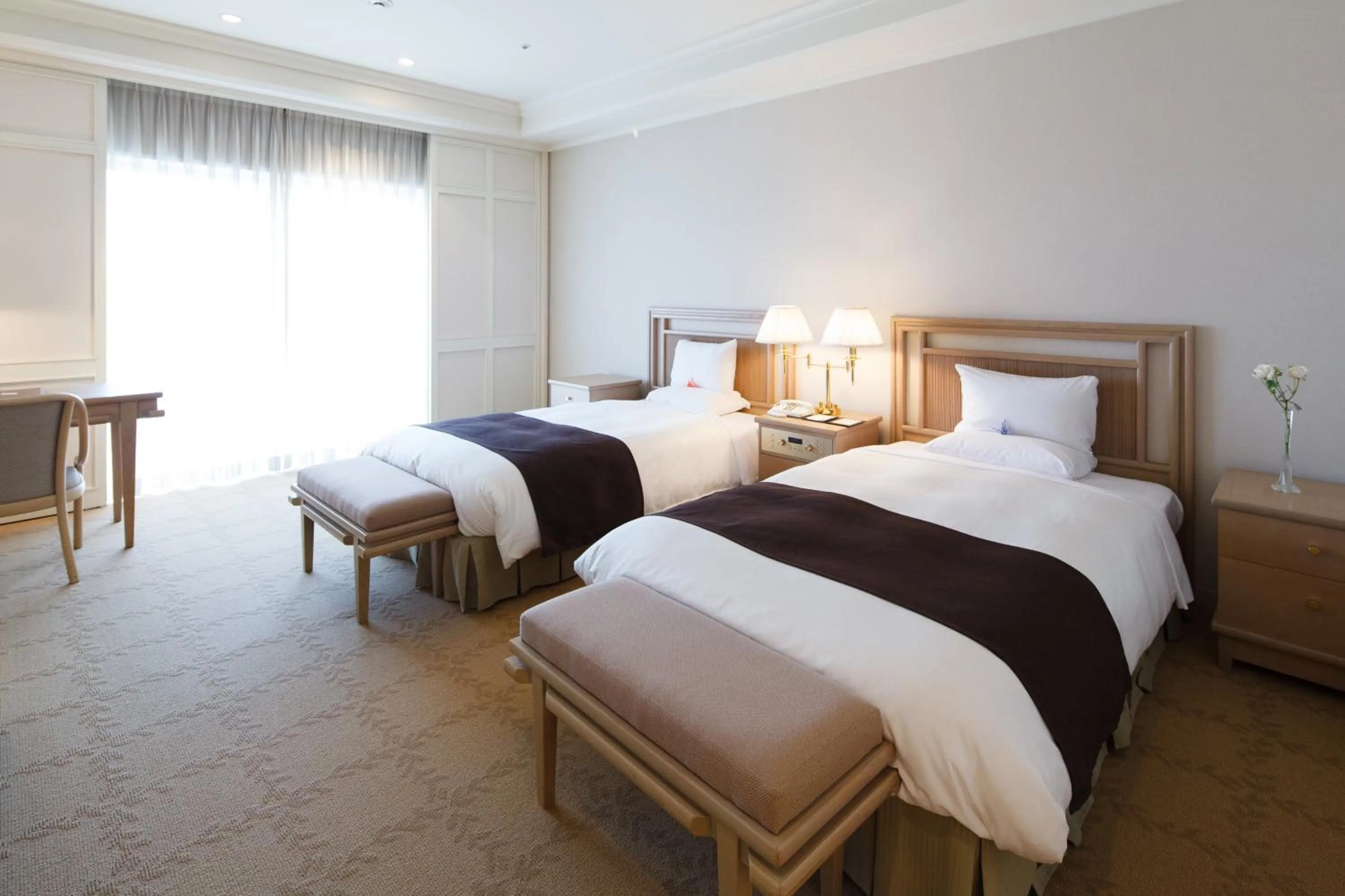 Bed in Okura Akademia Park Hotel