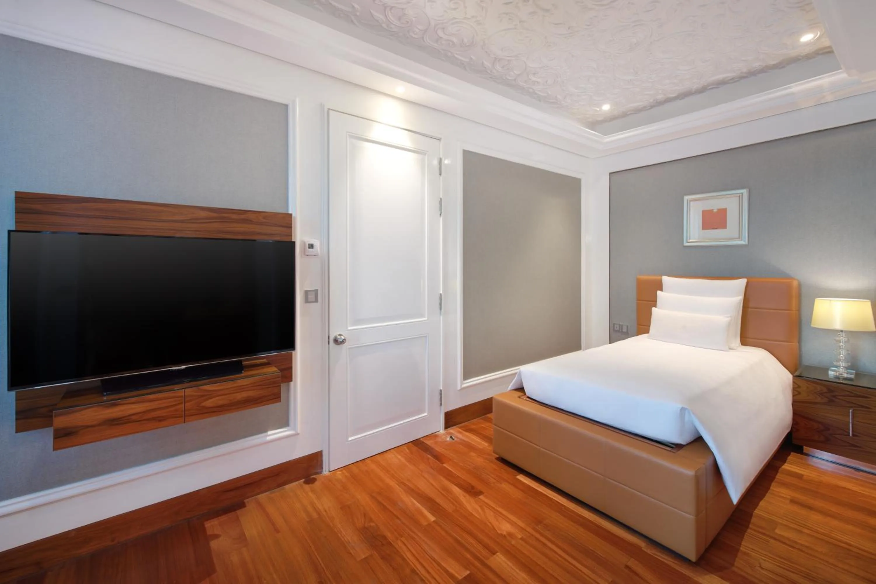 Bed in The Reverie Saigon Residential Suites