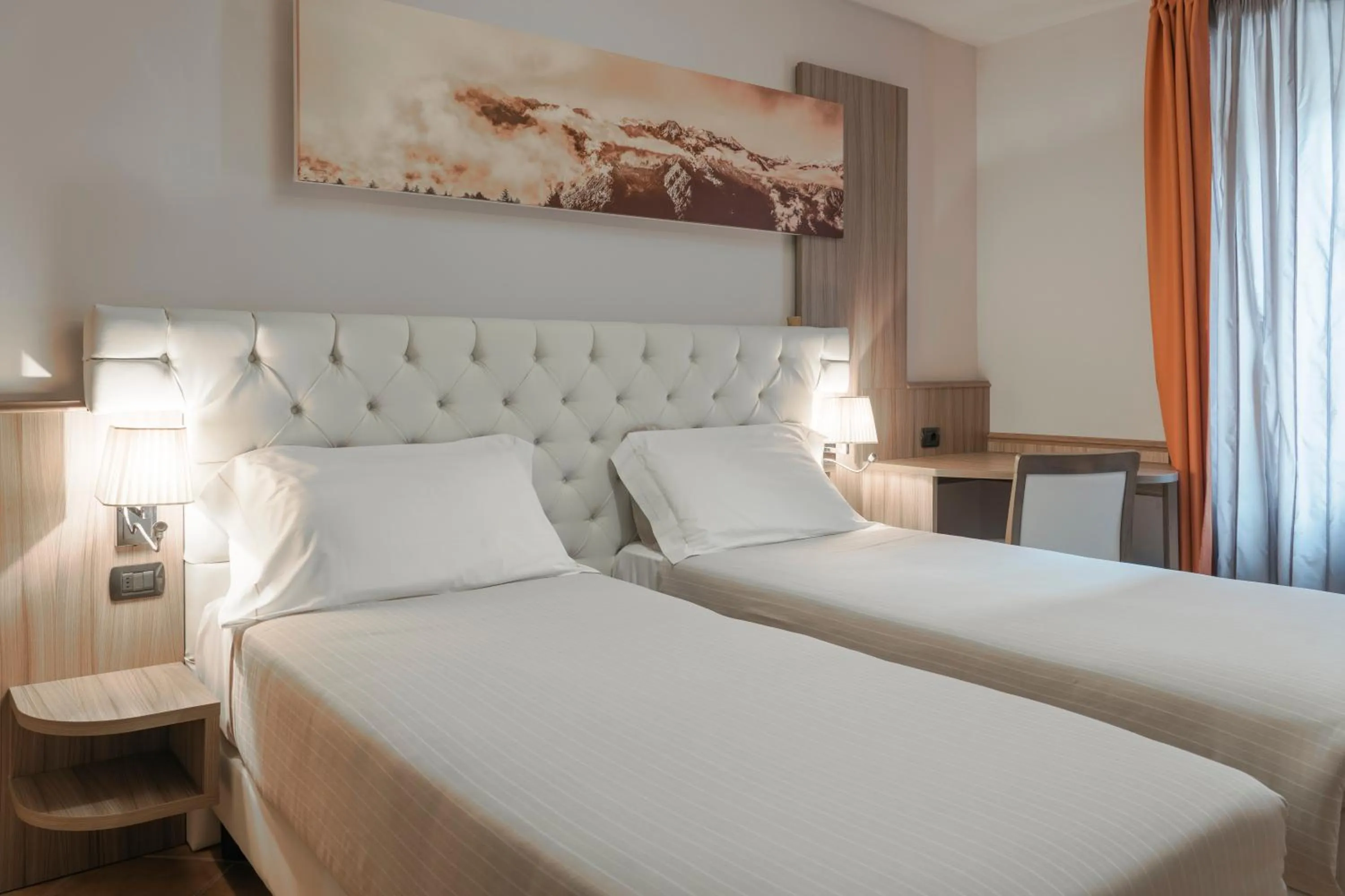 Bed in Hotel Garnì Cristallo