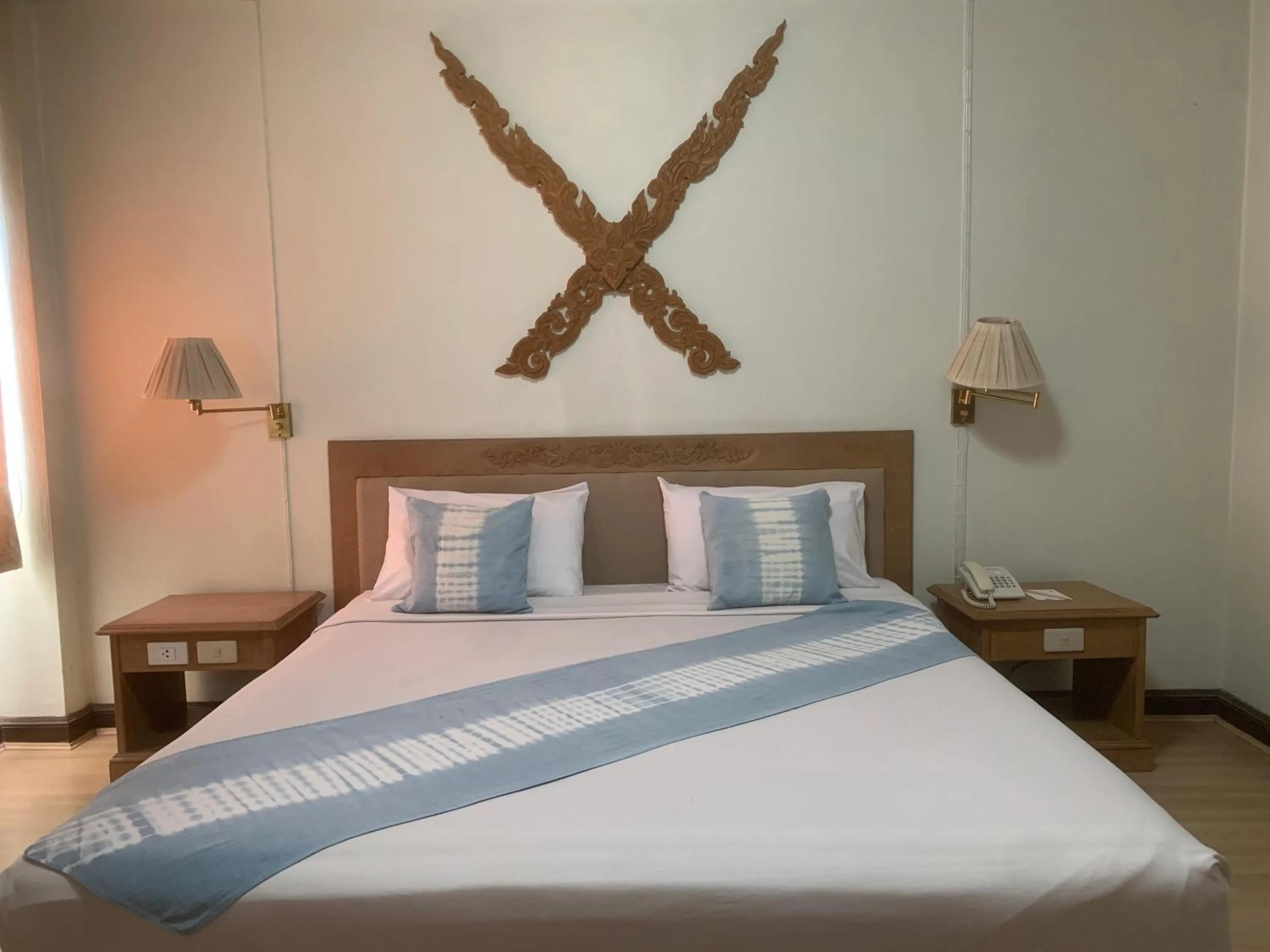 Bed in Maeyom Palace Hotel