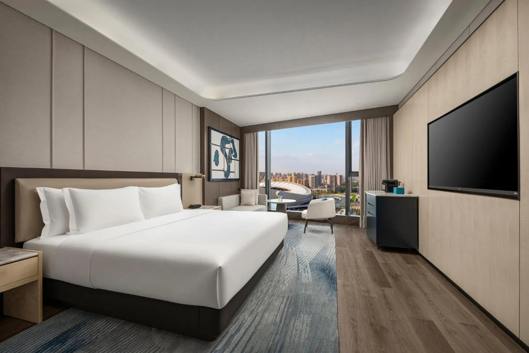 Photo of the whole room, Bed in Crowne Plaza Linyi Olympic Sports Centre by IHG