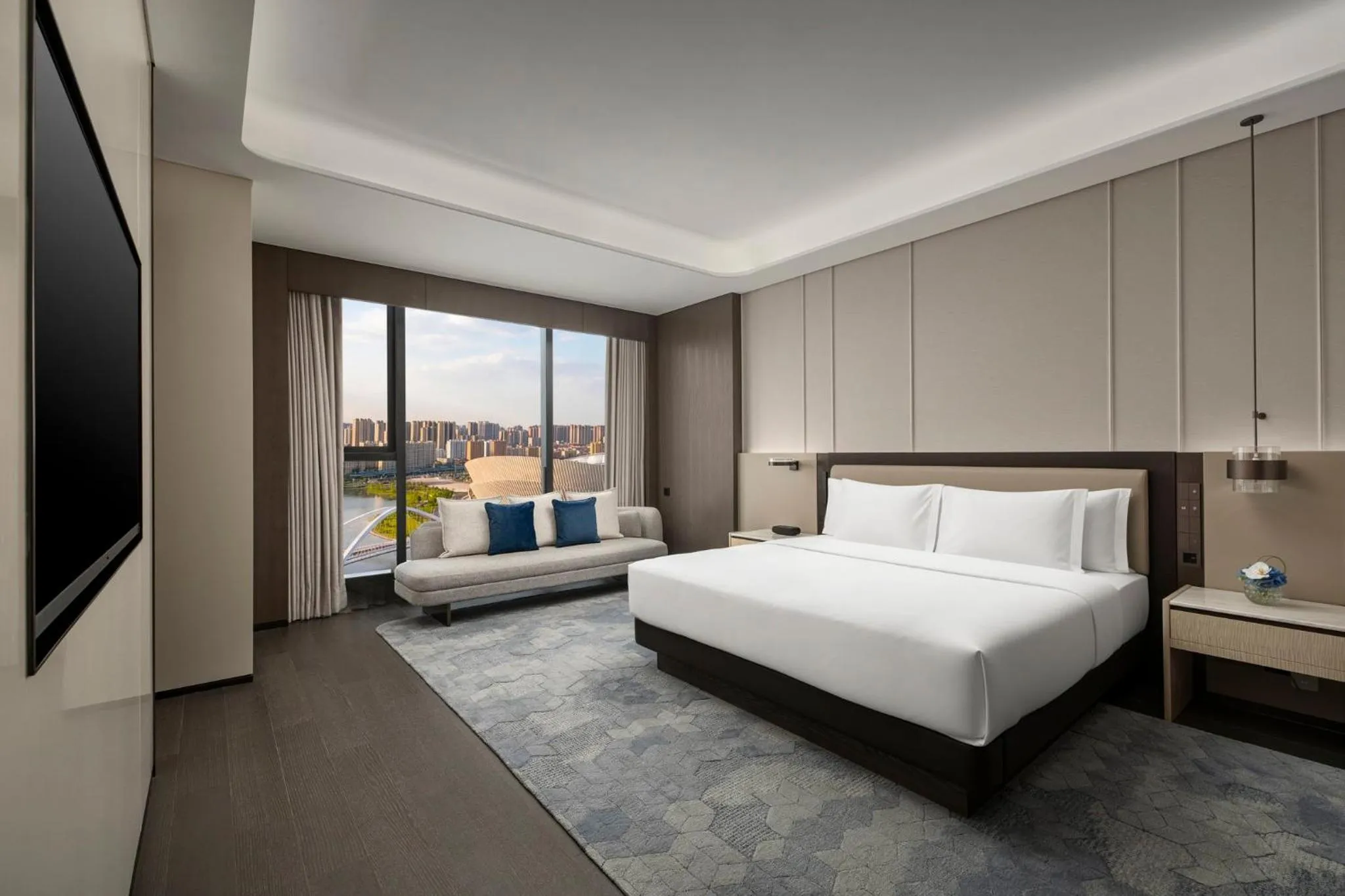 Photo of the whole room, Bed in Crowne Plaza Linyi Olympic Sports Centre by IHG