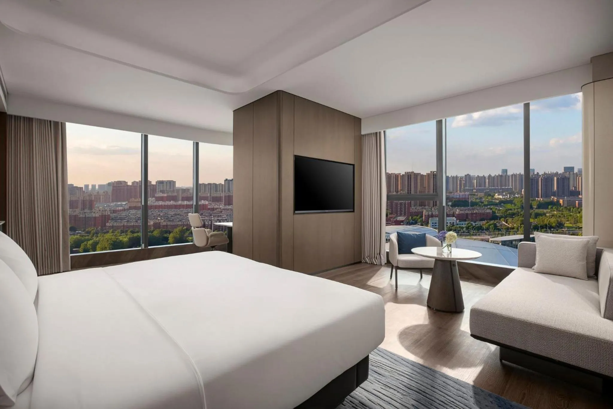Photo of the whole room, Bed in Crowne Plaza Linyi Olympic Sports Centre by IHG