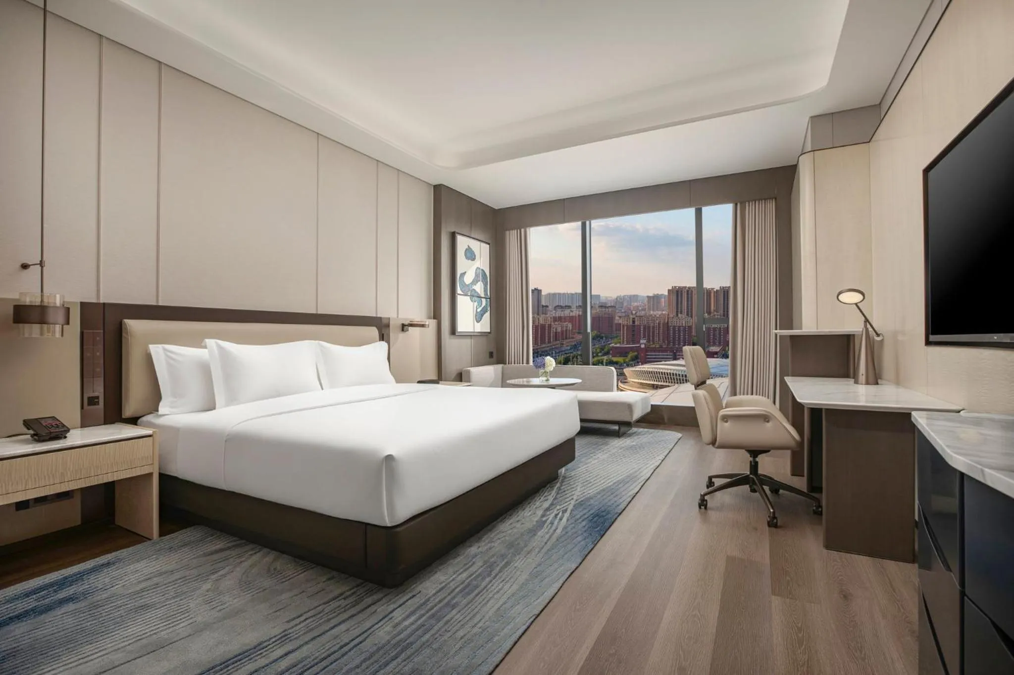 Photo of the whole room, Bed in Crowne Plaza Linyi Olympic Sports Centre by IHG