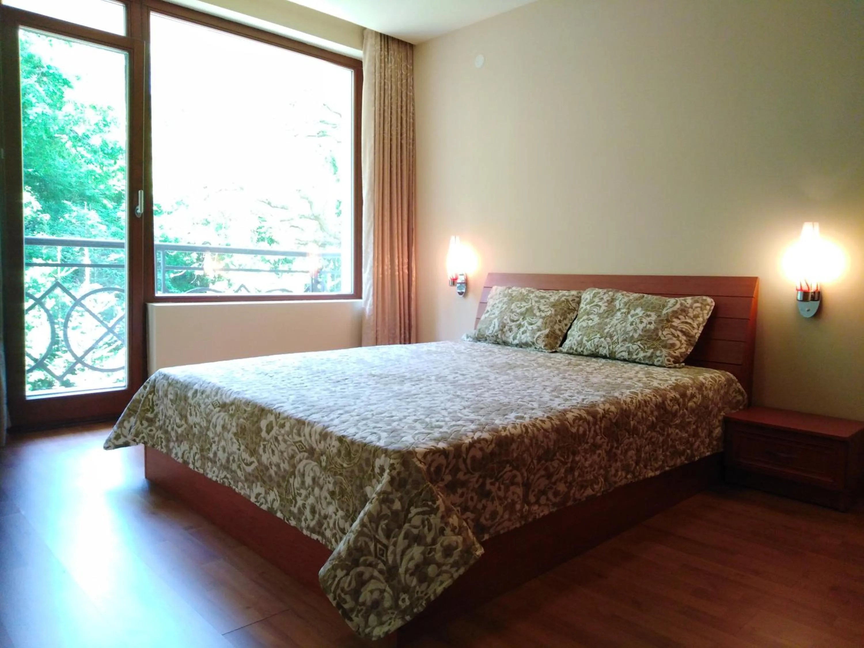 Bed in Sea View Rental Iglika Apartments