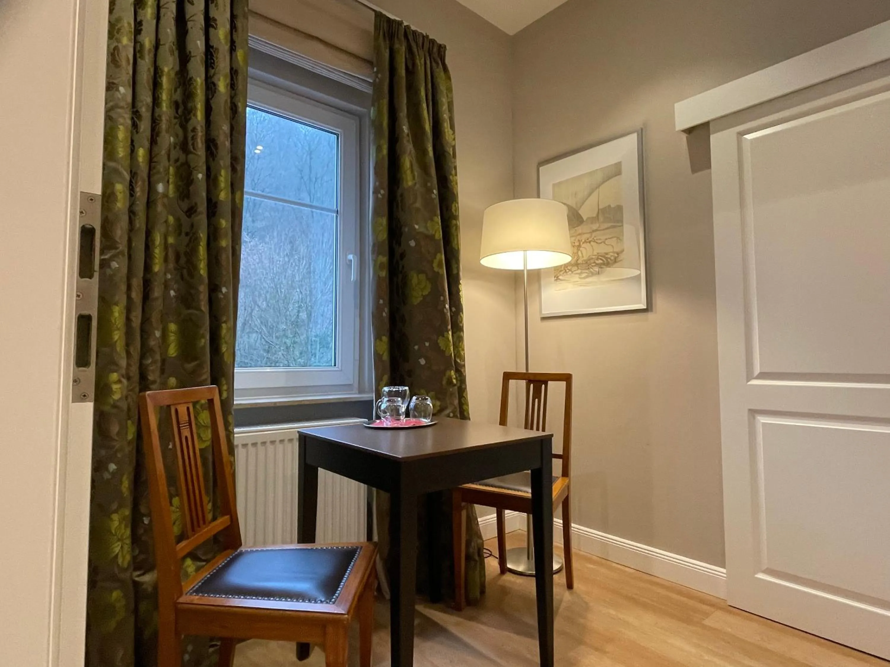 Living room in Villa Waldfrieden - Design trifft Budget