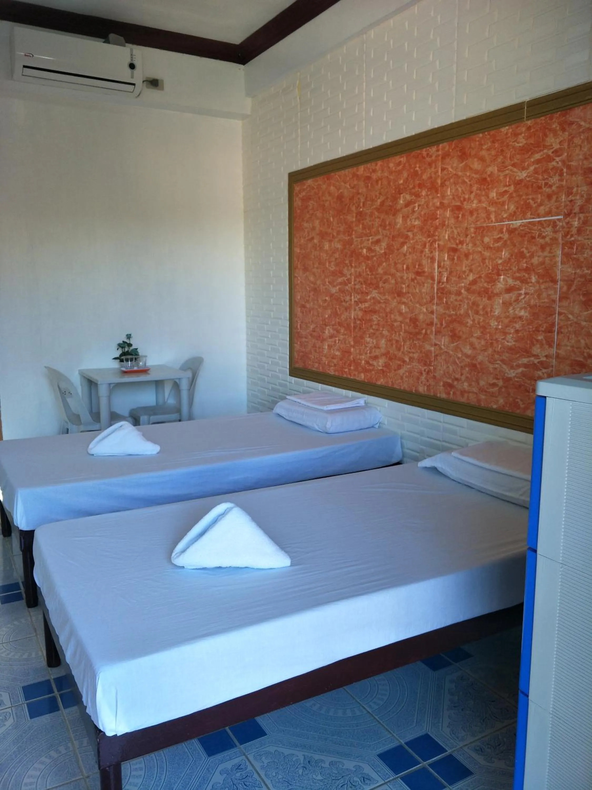 Bed in First Baby Bytes Guest House