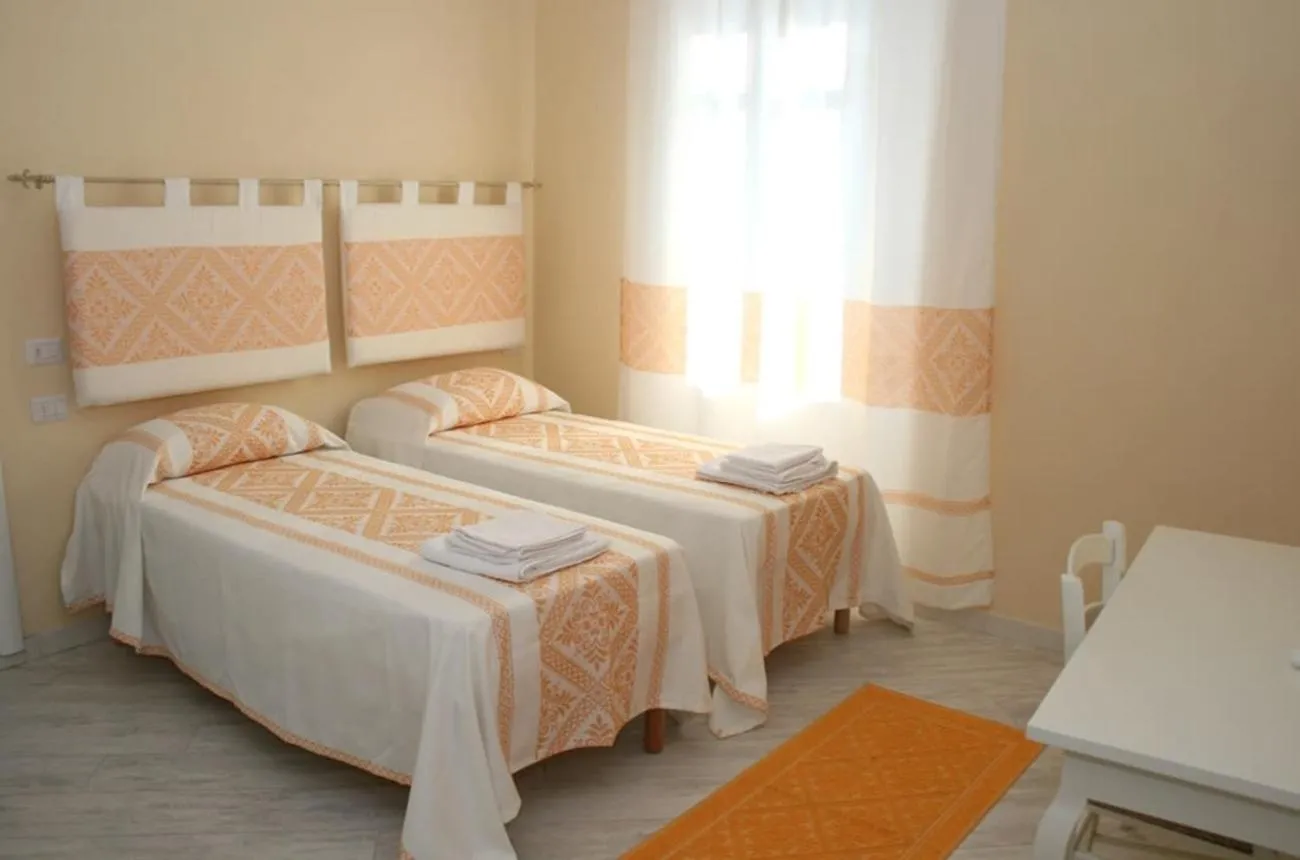 Bed in Guest House Le Gemelle