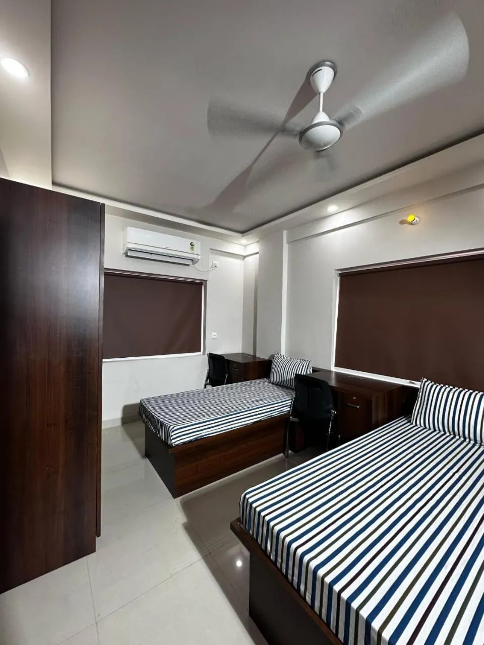 Twin Room - single occupancy in Yuvi Grand Residency