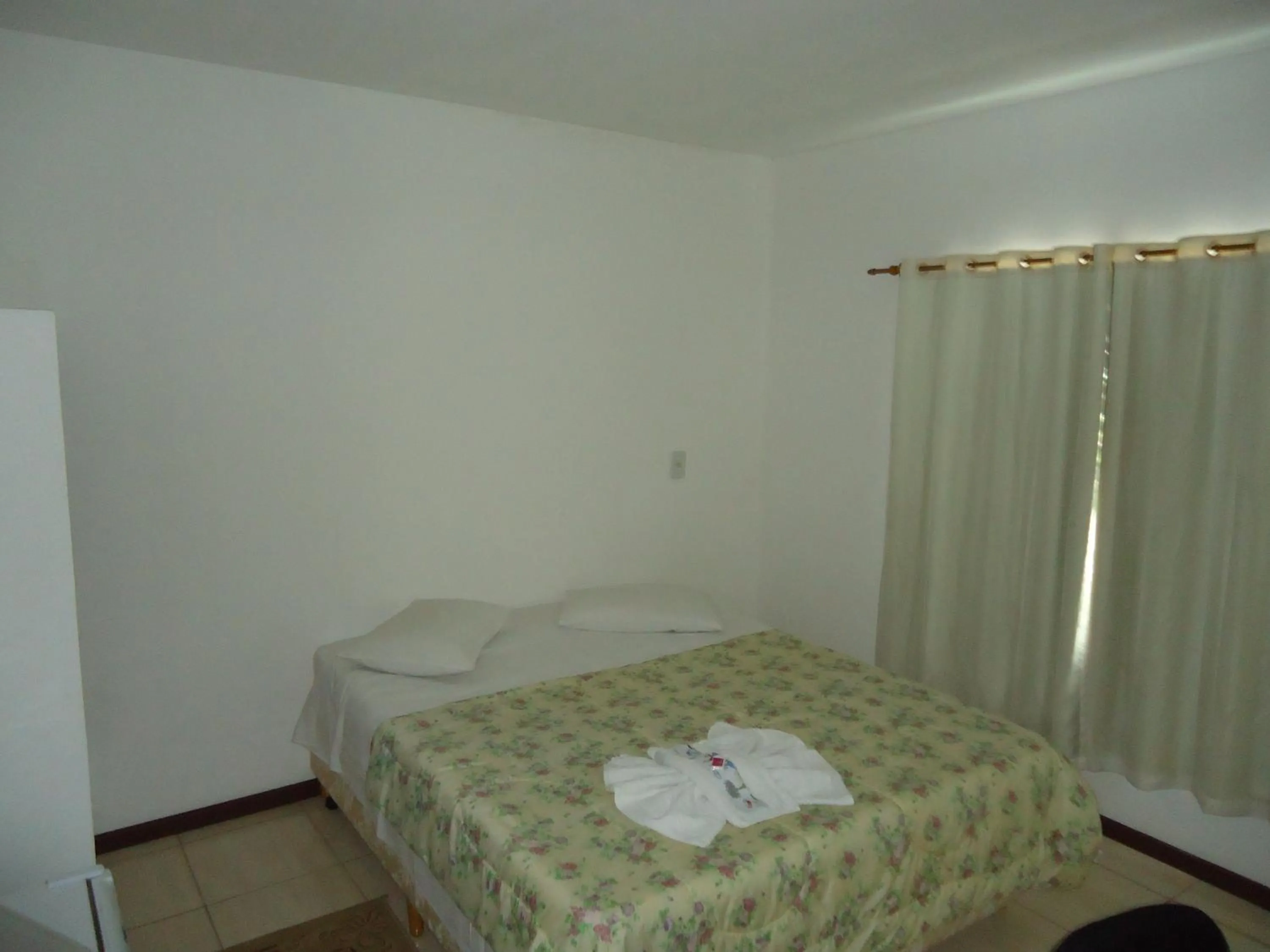 Photo of the whole room, Bed in Iria's Hotel