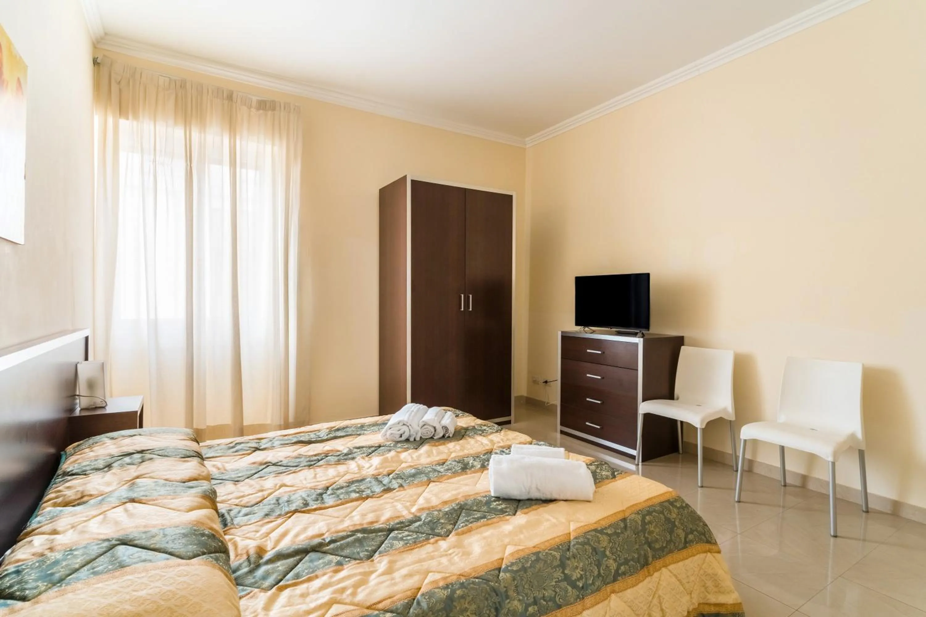 Living room, Bed in Palazzo Mongiò