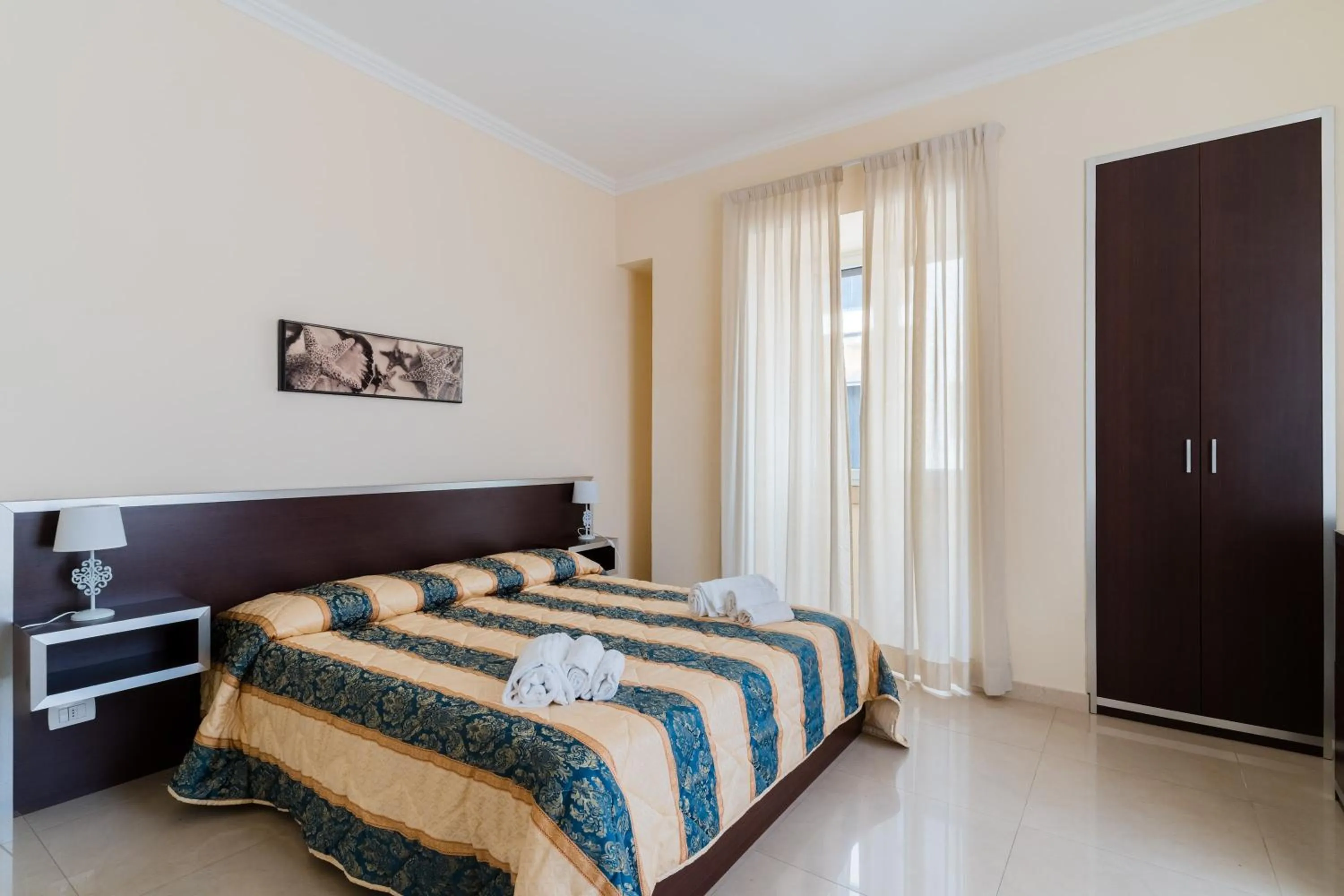 Living room, Bed in Palazzo Mongiò