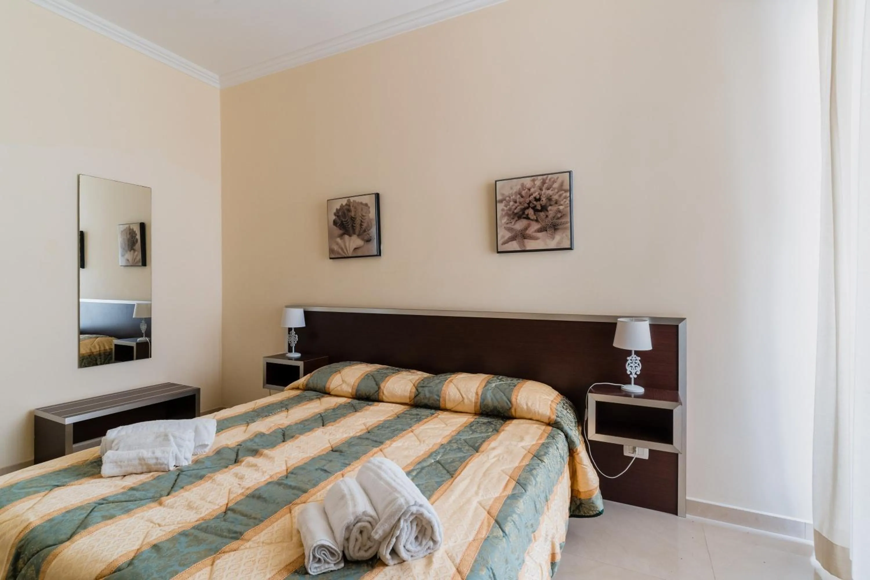 Living room, Bed in Palazzo Mongiò