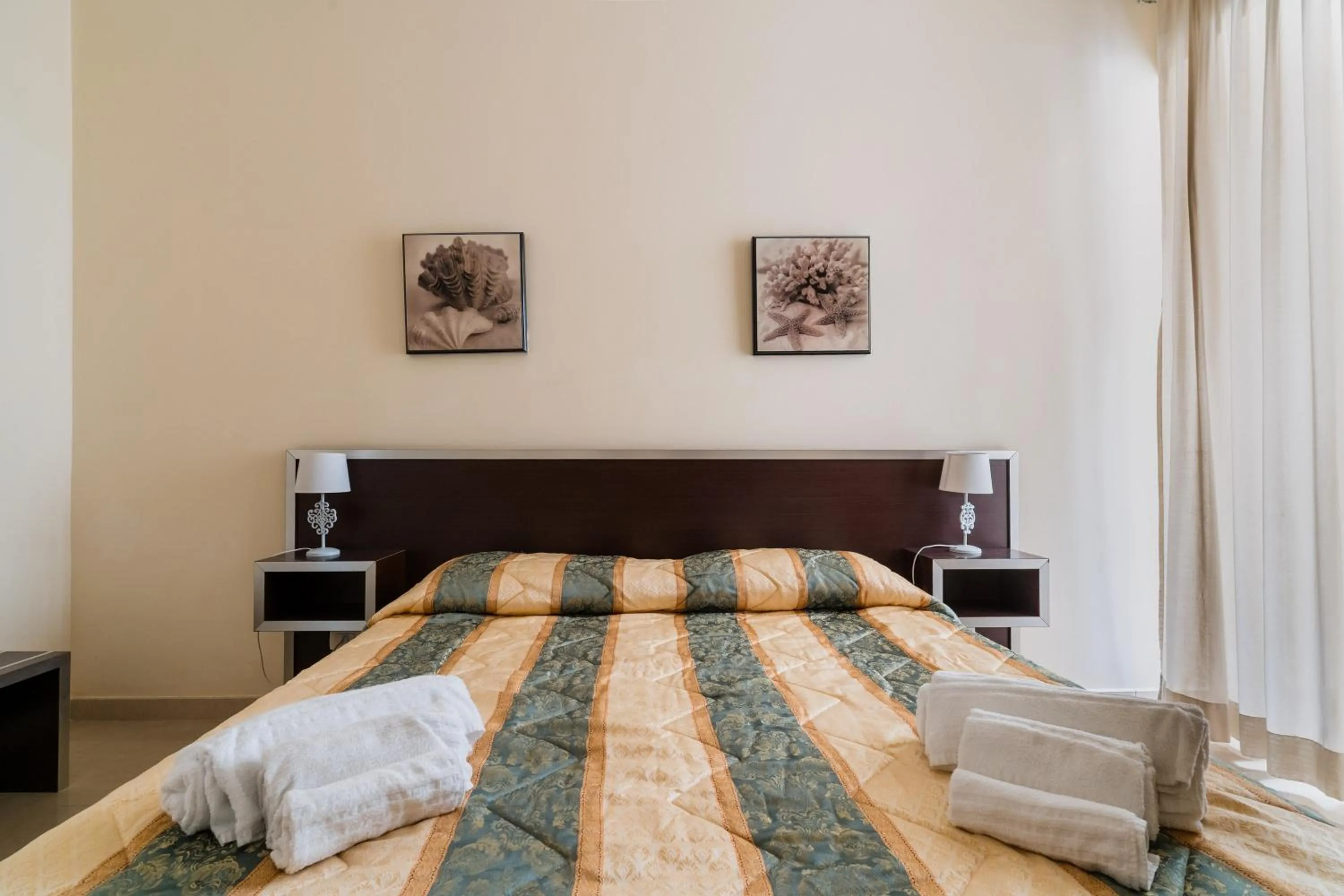 Living room, Bed in Palazzo Mongiò