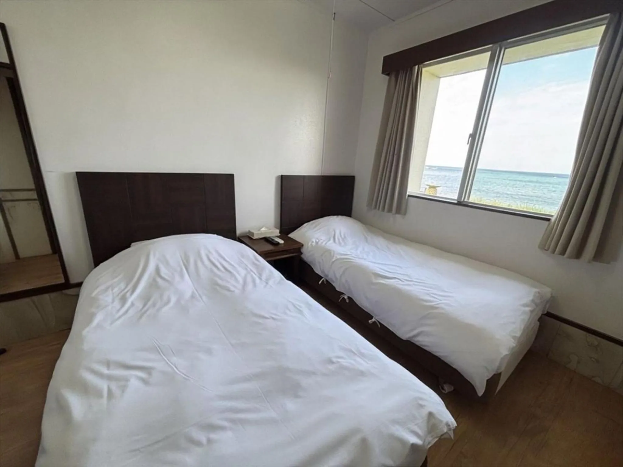 Photo of the whole room, Bed in Hotel Oceans Nakijin