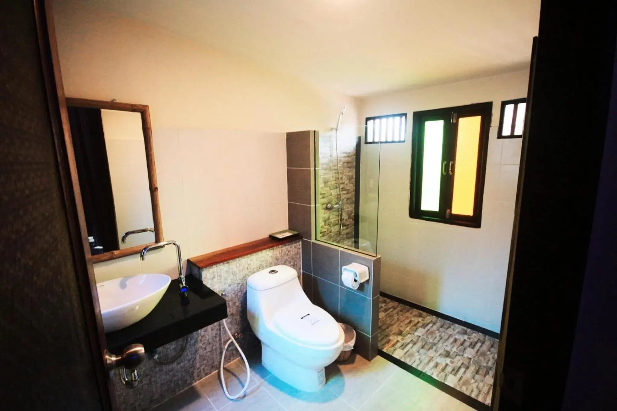 Bathroom in Coco Cape Lanta Resort (SHA Extra Plus)