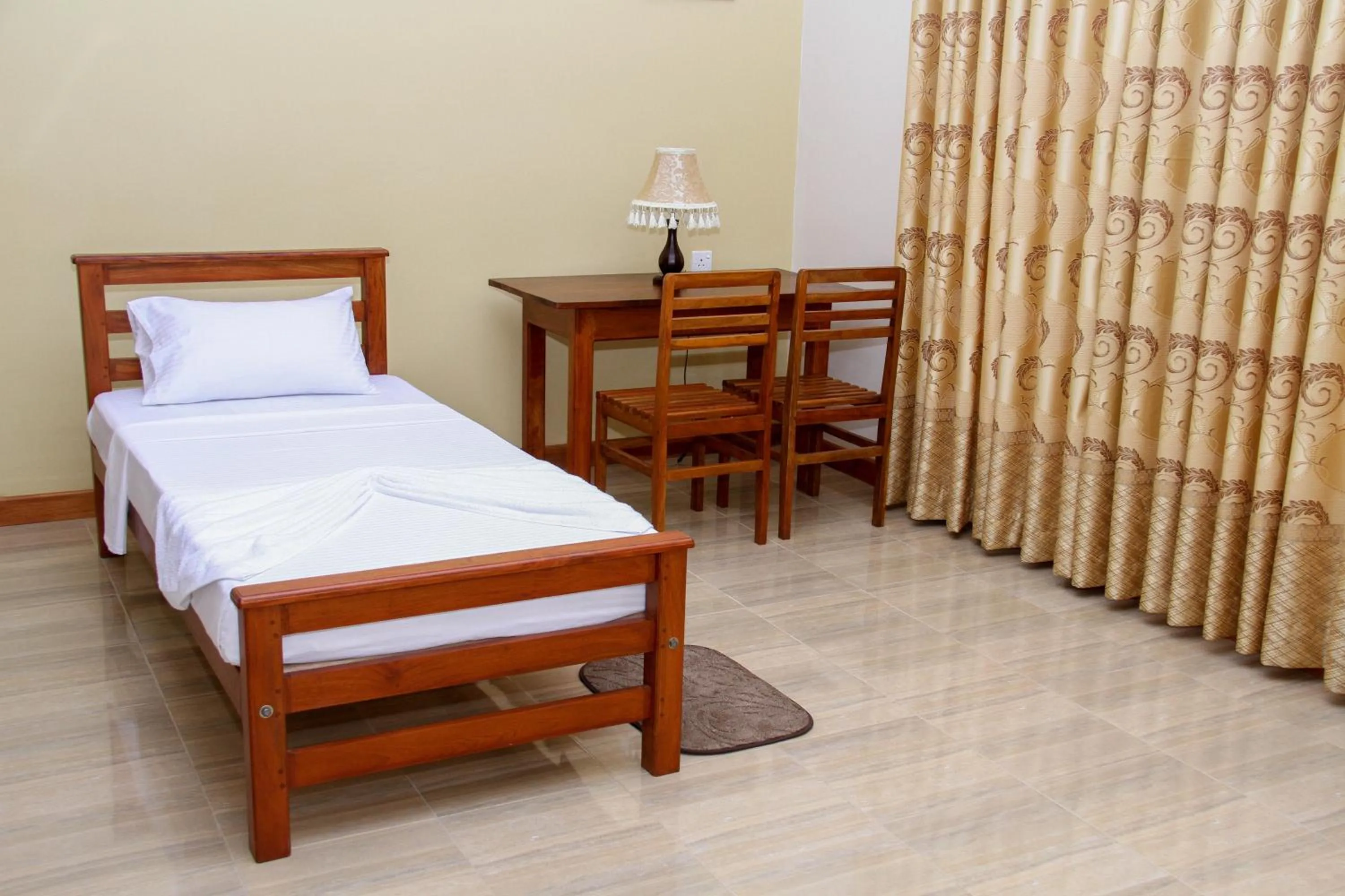 Photo of the whole room, Bed in Hotel Nilketha Yala Tissamaharama