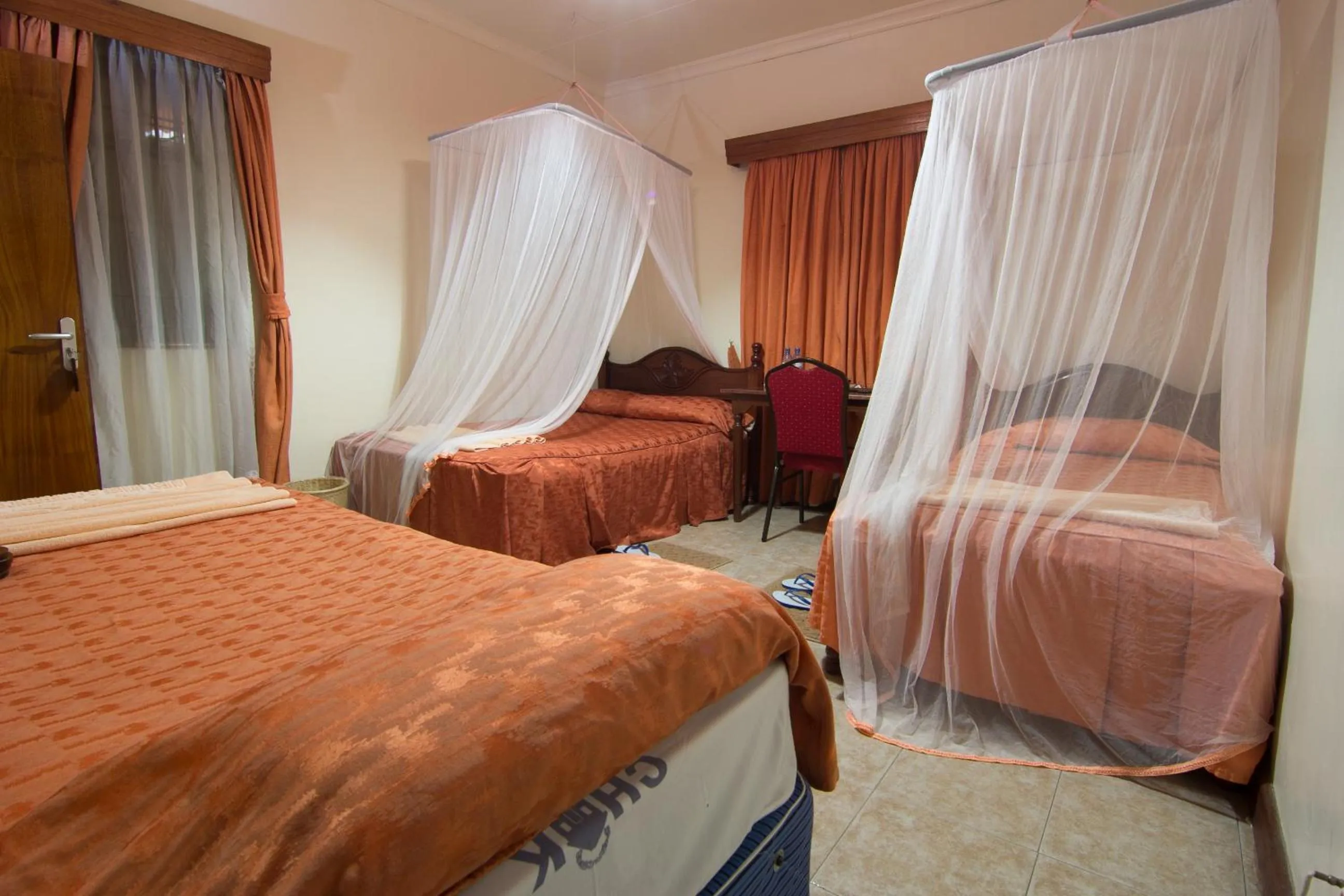 Photo of the whole room, Bed in Chak Guesthouse & Conference Center
