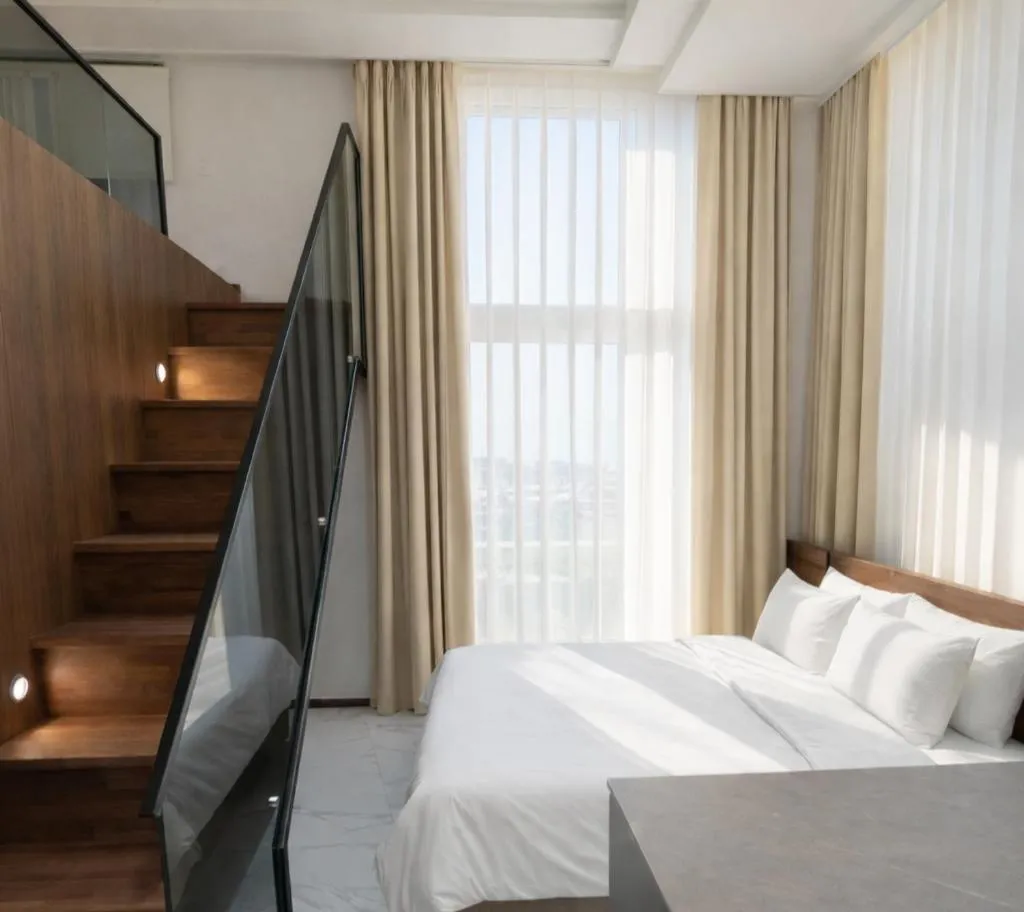 Bed in Magnum Nampo Hotel